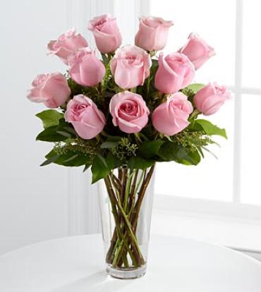 The Long Stem Pink Rose Bouquet The Long Stem Pink Rose Bouquet - Picture-perfect soft pink roses make a beautiful gift for the lovely lady in your life. Wife, mother, daughter or sweetheart, she's sure to cherish this bouquet of pastel pink roses accented with seeded eucalyptus and arranged in a clear glass vase. (Vase/Basket style may vary) Item # N14-4304