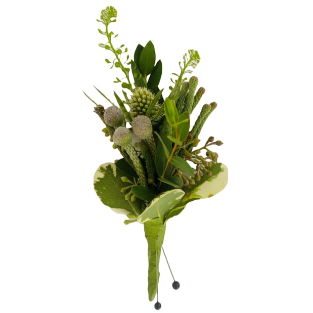 Boutonniere - Composite / Foliage - Elevate your formal look with our Composite Boutonniere, a unique and sophisticated accessory crafted with an artful arrangement of various fresh foliages. Perfect for weddings, proms, homecoming dances, or any special formal occasion, this boutonniere exudes a modern, natural charm. Featuring a harmonious blend of textures and greens, it’s a refined choice for those seeking a stylish and understated alternative to floral boutonnieres. -Key Features: **Various Fresh Foliages: Includes a mix of eucalyptus, ivy, ferns, or other lush greenery for a textured, organic look. **Minimalist and Modern Design: Focuses on natural elegance, making it ideal for contemporary formal styles. **Handcrafted Quality: Thoughtfully designed to ensure a polished and cohesive appearance. **Secure Attachment: Comes with a sturdy pin for easy and comfortable wear throughout the event. -Benefits: **A versatile and stylish choice that pairs perfectly with a variety of suit or tuxedo styles. **Ideal for those who prefer a foliage-focused boutonniere or a modern, nature-inspired design. **Lightweight and comfortable, ensuring ease of wear for long events. **Handcrafted with care to ensure freshness and high-quality craftsmanship. The Composite Boutonniere is a perfect blend of simplicity and sophistication, making it a standout accessory for any formal celebration. Order yours today to add a touch of natural elegance to your special day!