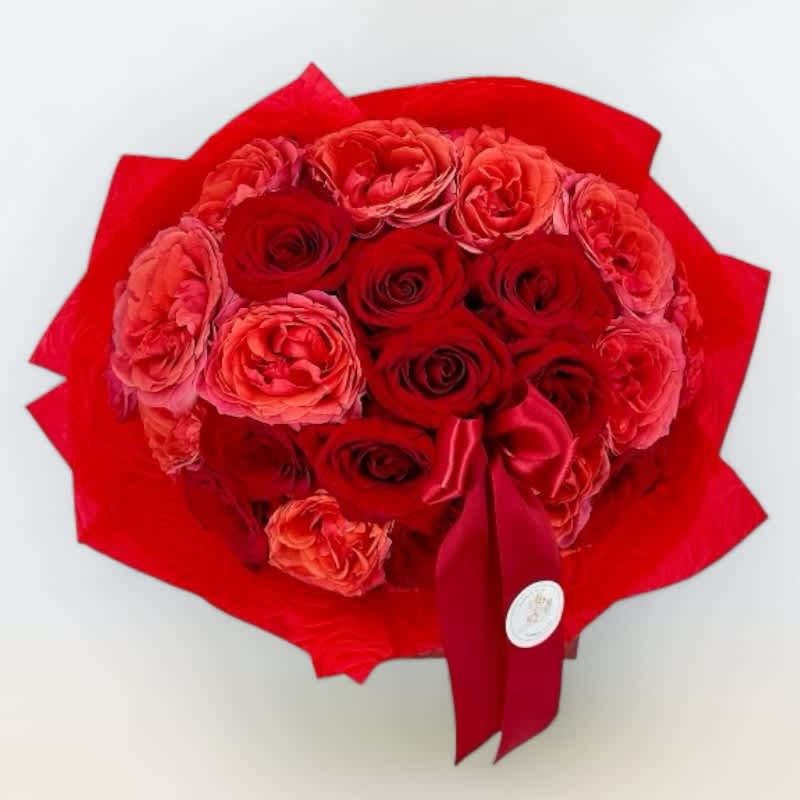 Romantic Red Roses #34 - This exquisite arrangement features wrapped two dozens radiant red roses, each bloom whispers tales of romance and commitment. Whether celebrating an anniversary or declaring your love, this bouquet is a symbol of enduring affection and classic elegance. Order now for this timeless expression of love. Secure this exquisite bouquet to create lasting memories for your special someone.