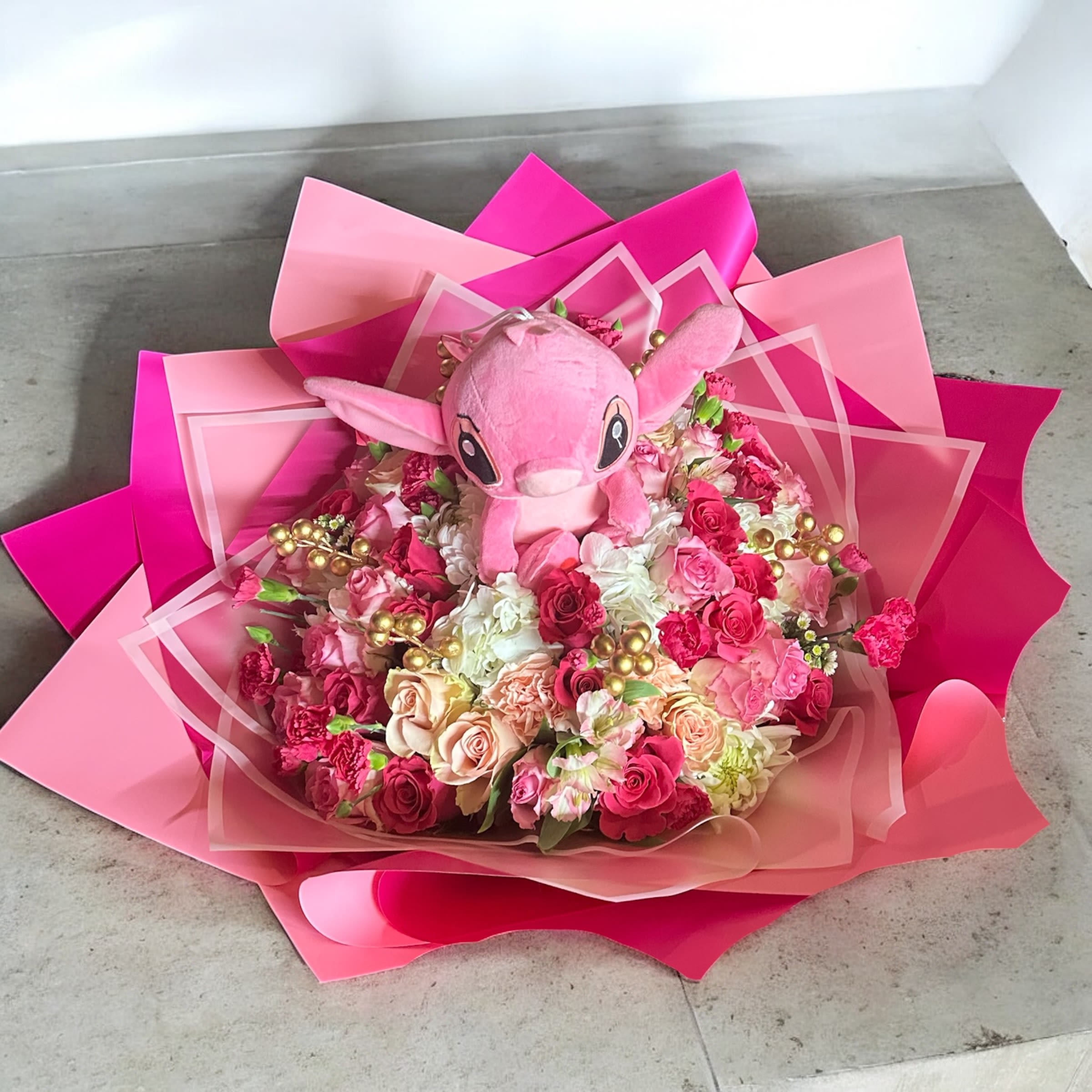 stich pink  - beautiful bunch of stich with flowers in shades of pink and very elegant for any occasion