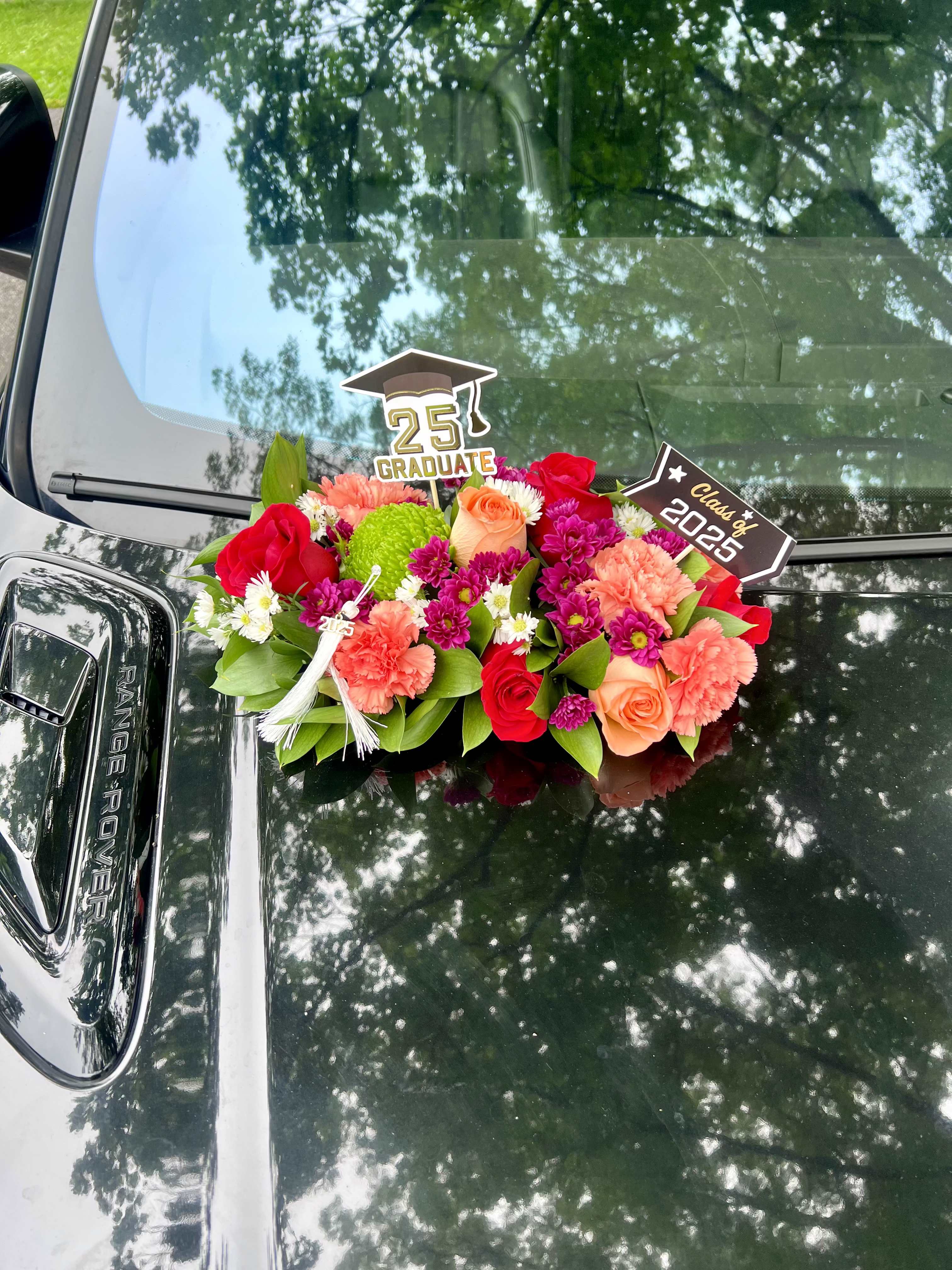 Graduation Car Arrangement Graduation Car Arrangement - Have a unique arrangement featuring your big day in your vehicle, flowers colors accessories vary as well in size 4in 6 in 8 in