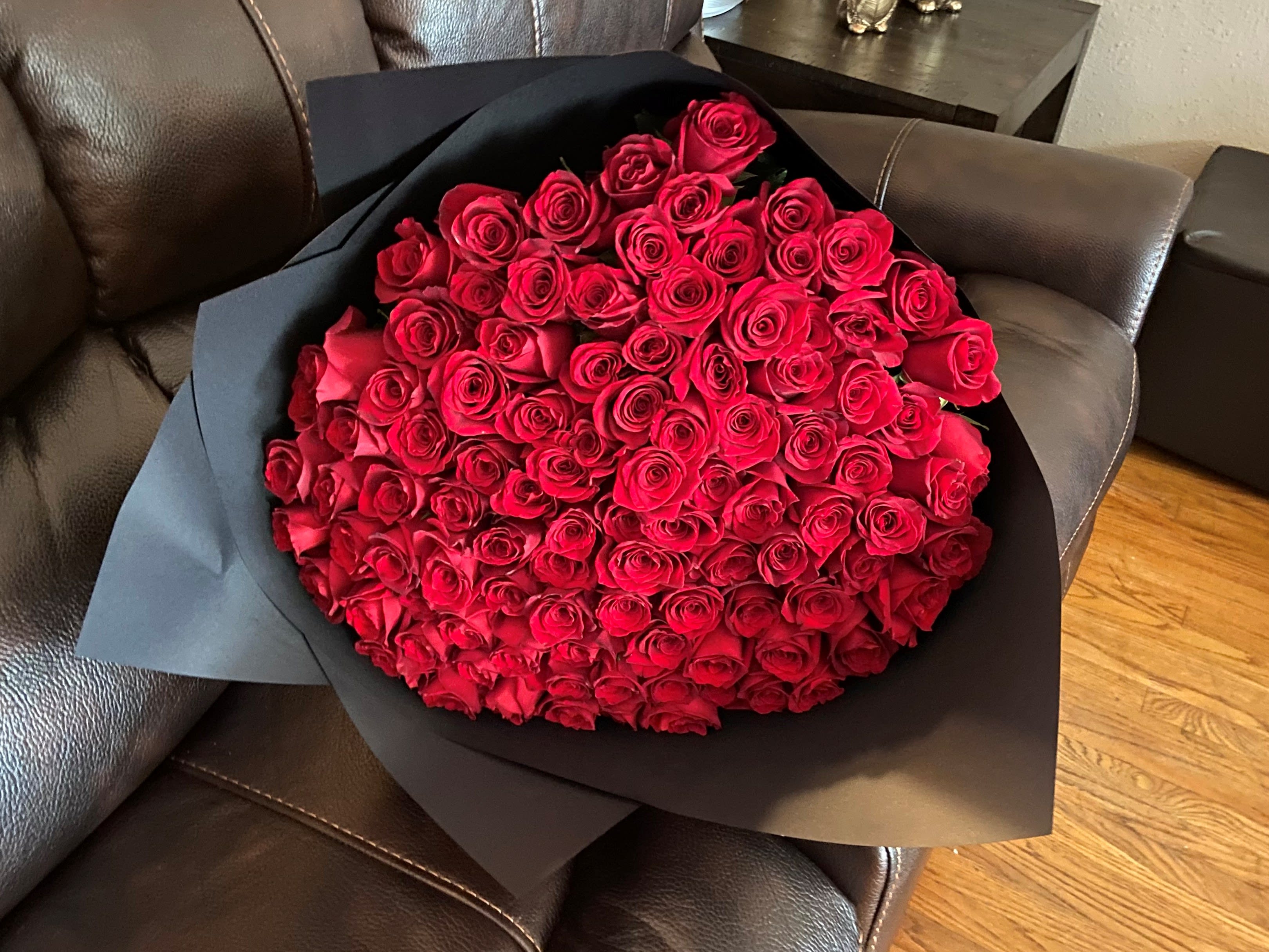 Taliz 100 Roses Bouquet  - 100 Beautiful Bouquet Red Roses  70 cm Long Stem, Wrapped with Black Paper, and Red Ribbon.