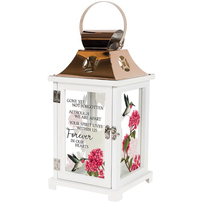 Sympathy Lantern 13.5&quot; - Forever In Our Hearts - The Forever In Our Hearts Carson brand Flameless LED lantern is a beautiful and thoughtful way to express comfort and sympathy. Crafted with high-quality wood and glass, this lantern features a stainless steel top with a copper finish and a metal handle, allowing it to be displayed anywhere in the home.  Each Forever In Our Hearts Carson LED Lantern comes with a built-in automatic timer, which is powered by the included AAA batteries. The timer provides a warm, welcoming glow for 6 hours, followed by 18 hours of rest, ensuring long-lasting use. This lantern is suitable for hanging or display free-standing, and is designed for indoor use only.  Featuring a full-color picturesque motif of humming birds flying near precious pink hydrangea blooms, this lantern adds a stunning and personalized touch to any home. You can even choose deluxe options with silk floral accents when ordering online to create an even more unique and special gift.  This lantern makes a thoughtful bereavement and condolence gift, which can be sent directly to the residence or funeral home in Muncie or surrounding areas.  Shop Paul Davis Flower Shop the best selection of Sympathy Gifts &amp; Memorial Lanterns in Muncie, IN.  Dimensions: 13.5&quot; x 6.25&quot; x 6.25&quot;