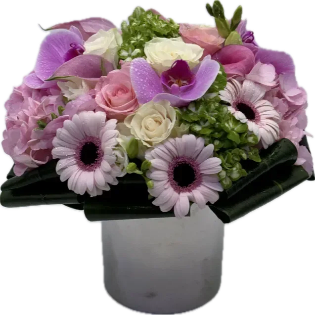 Blushing Meadow - (06) A captivating floral arrangement that weaves together the enchanting beauty of delicate pink blossoms and the fresh vitality of vibrant greenery.