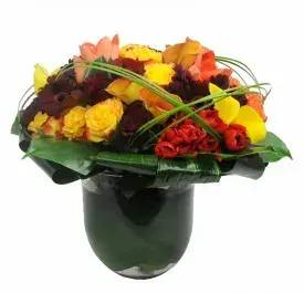 Summer Storm - (60) Beautiful Summer arrangement with contrasting accent flowers. Substitutions may be necessary due to availability.