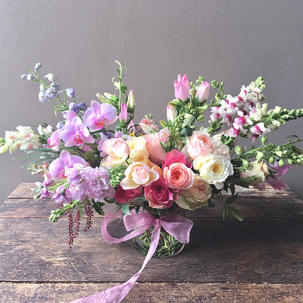 Zoet (Gallery Photo) Zoet (Gallery Photo) - A bouquet of sweet delights! Soft tones of garden roses and other seasonal flowers are artfully gathered with love. And love is growing right out of this vase! Send your precious thoughts with these blooms, and let these flowers touch their hearts!