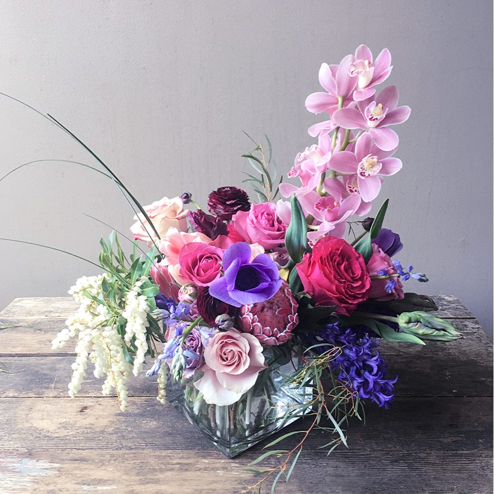 Josephine (Gallery Photo) - This exotic floral design will add a sophisticated beauty to anyone's day! A botanical expression of a vivid season and a unique composition of a bouquet makes this such an artful gift!