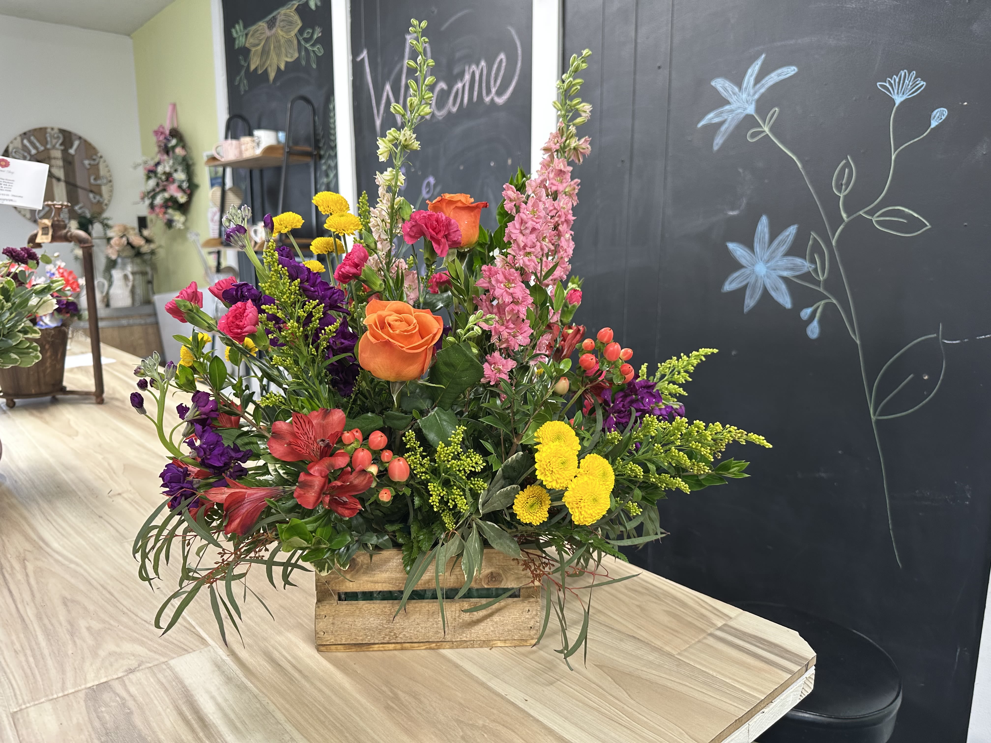 Seasonal Blooming Crate - A large variety of colors and flowers determined by the season.