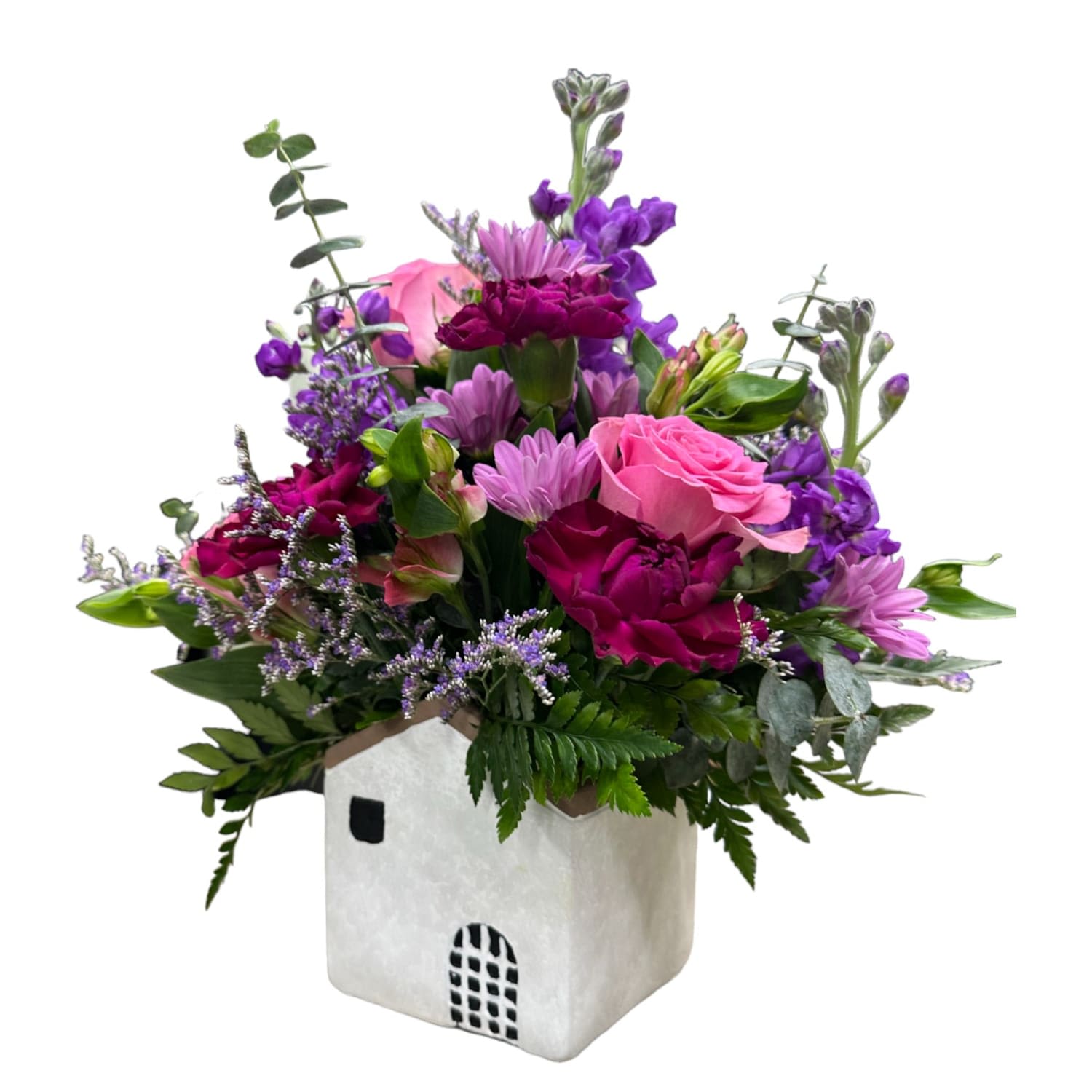 Home Sweet Home - This home-sweet-home arrangement is filled with our florist's choice of fresh flowers and greenery. This arrangement is a great gift for anyone settling into a new home and the cute house can be reused as a planter!