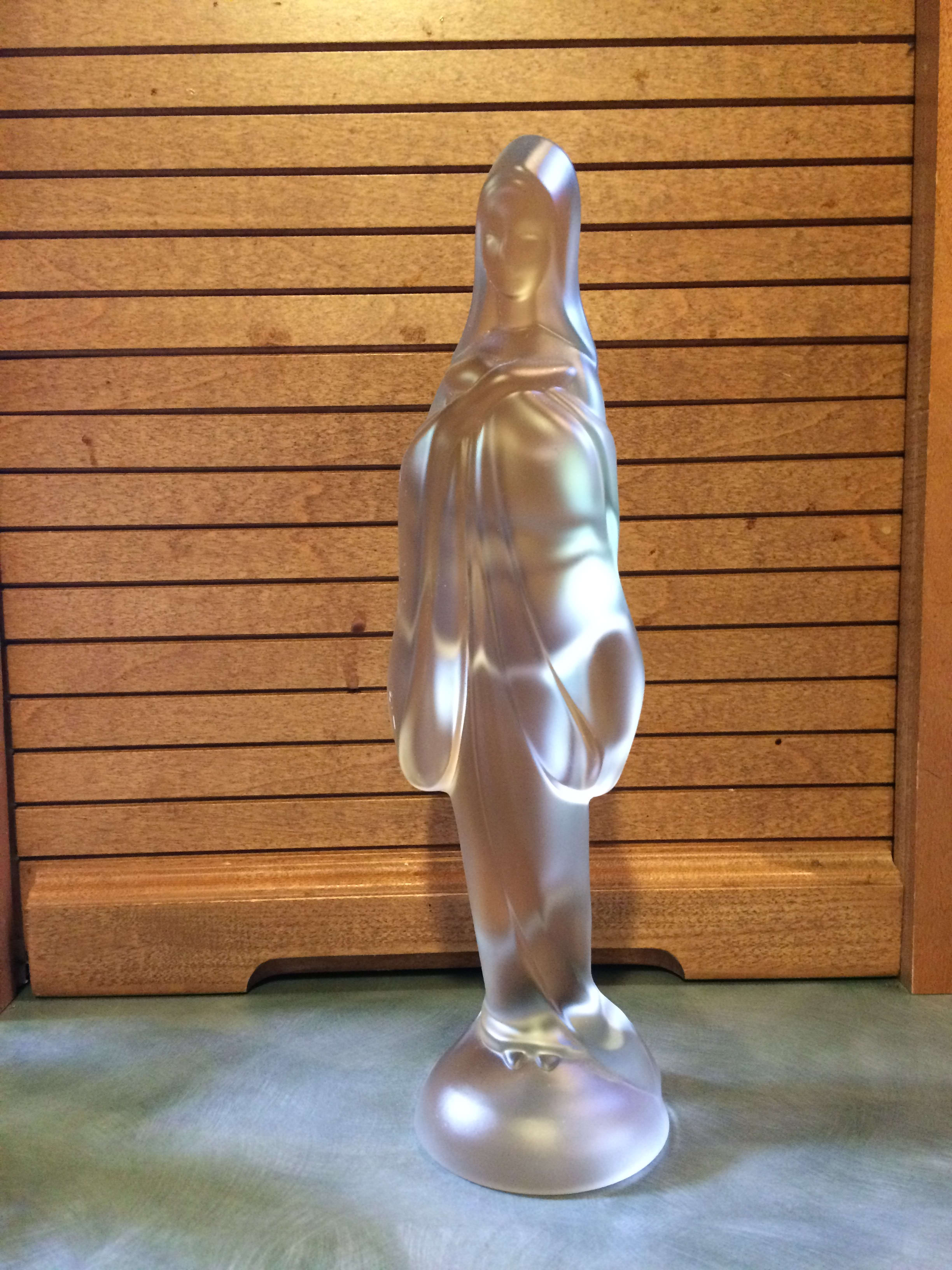 Virgin Mary Statue - 1950's Frosted glass Virgin Mary Statue complements any Sympathy design when placed near or into the design. Can also be placed near the sign in table. Great add-on for Memorial Services There may be some tiny bubbles and or straw marks (creases) in some pieces, this is normal with glass from this era.  9 7/8&quot; tall x 2 5/8&quot; diameter base. (1 available) 
