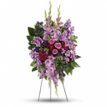Lavender Reflections Spray - Console and comfort with this luxurious spray of lavender roses, alstroemeria and gladioli. It's a majestic way to remember the departed at the memorial service.