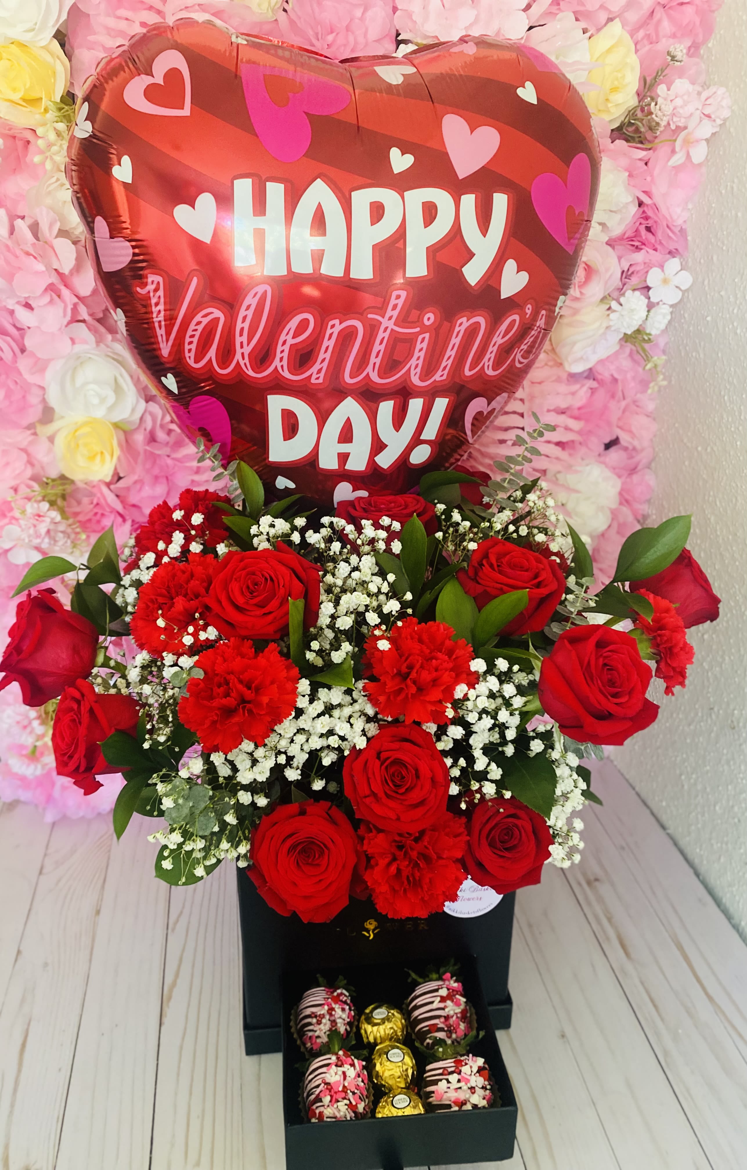 Red Rose Bloom Arrangement - Mix of (12) roses, carnations, greenery &amp; baby breath. With choice of balloon according to occasion &amp; 4 chocolate strawberries (decoration chosen by designer) 