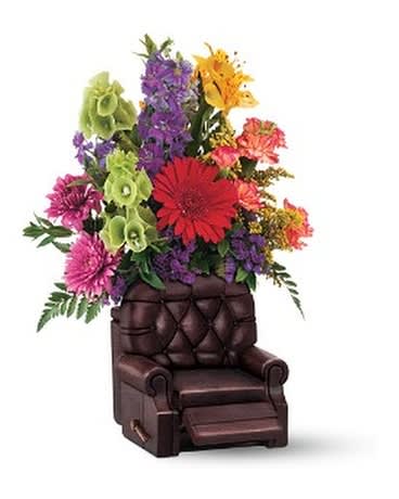 FATHER'S DAY BOUQUET - FATHER'S DAY  BOUQUET  Licensed by Barcalounger this realistic recliner is made of resin, includes a working footrest and has a bouquet that includes red/orange miniature carnations, purple chrysanthemums and statice, blue larkspur, yellow alstroemeria, red miniature gerbera and lush greenery including leatherleaf fern.