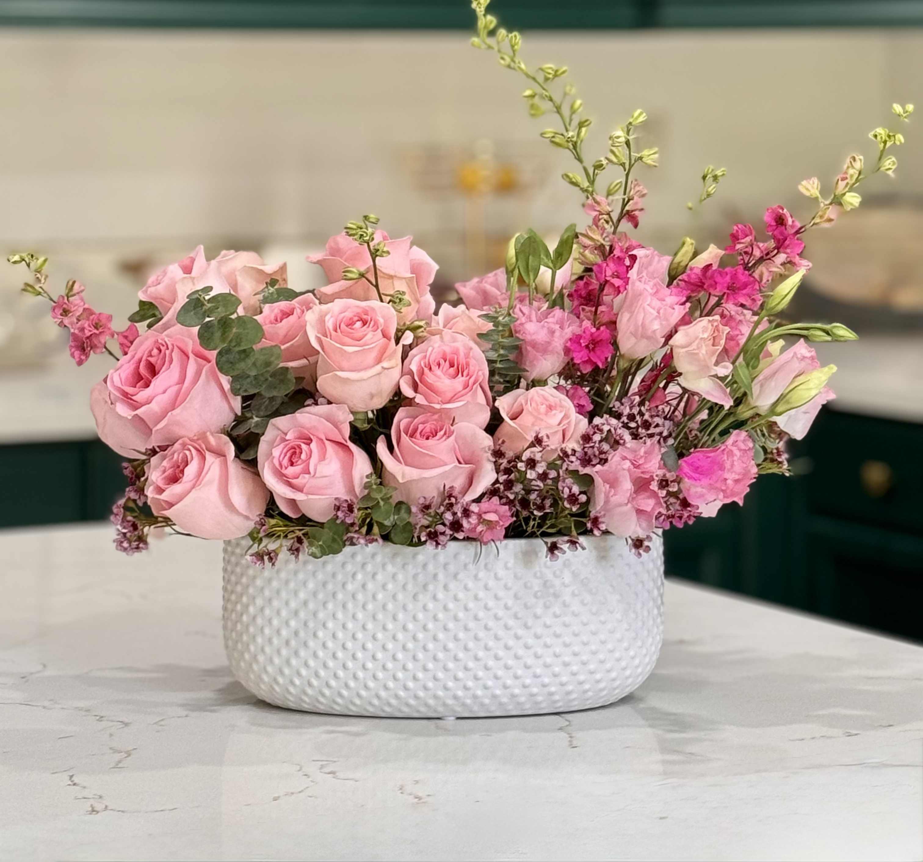 Petals in Pink   - Mix of vibrant fresh cut pink blooms. 
