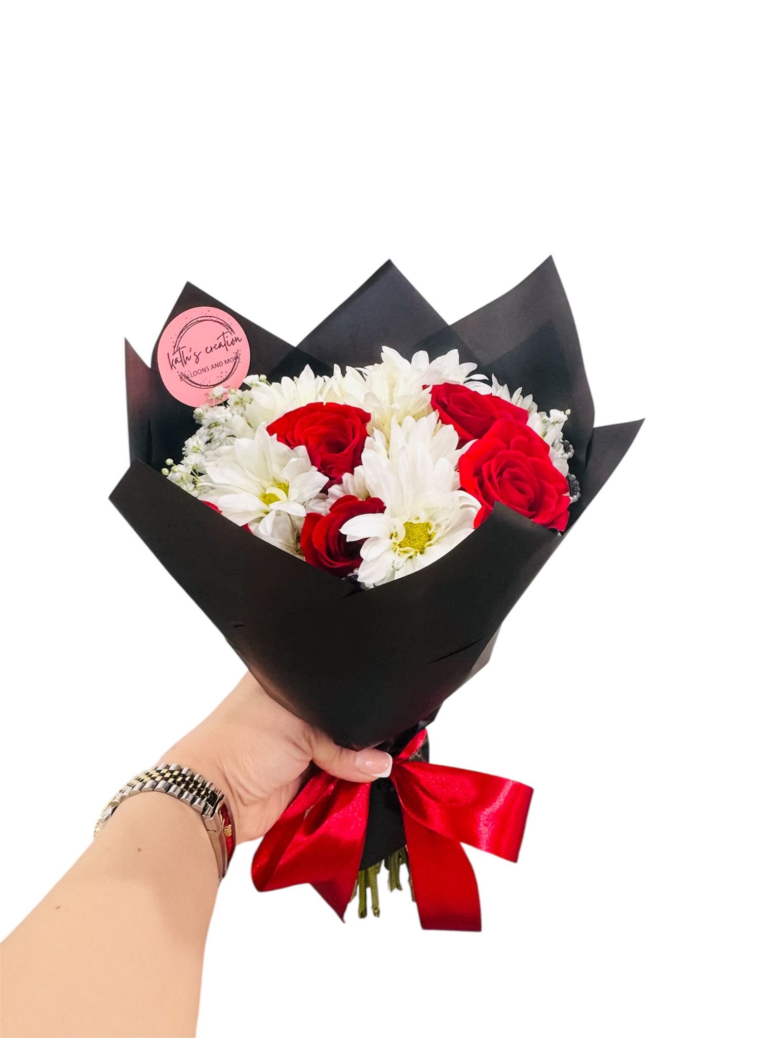 Pearl Bouquet  - It's a charming bouquet featuring red roses, white daisies, and baby breath.