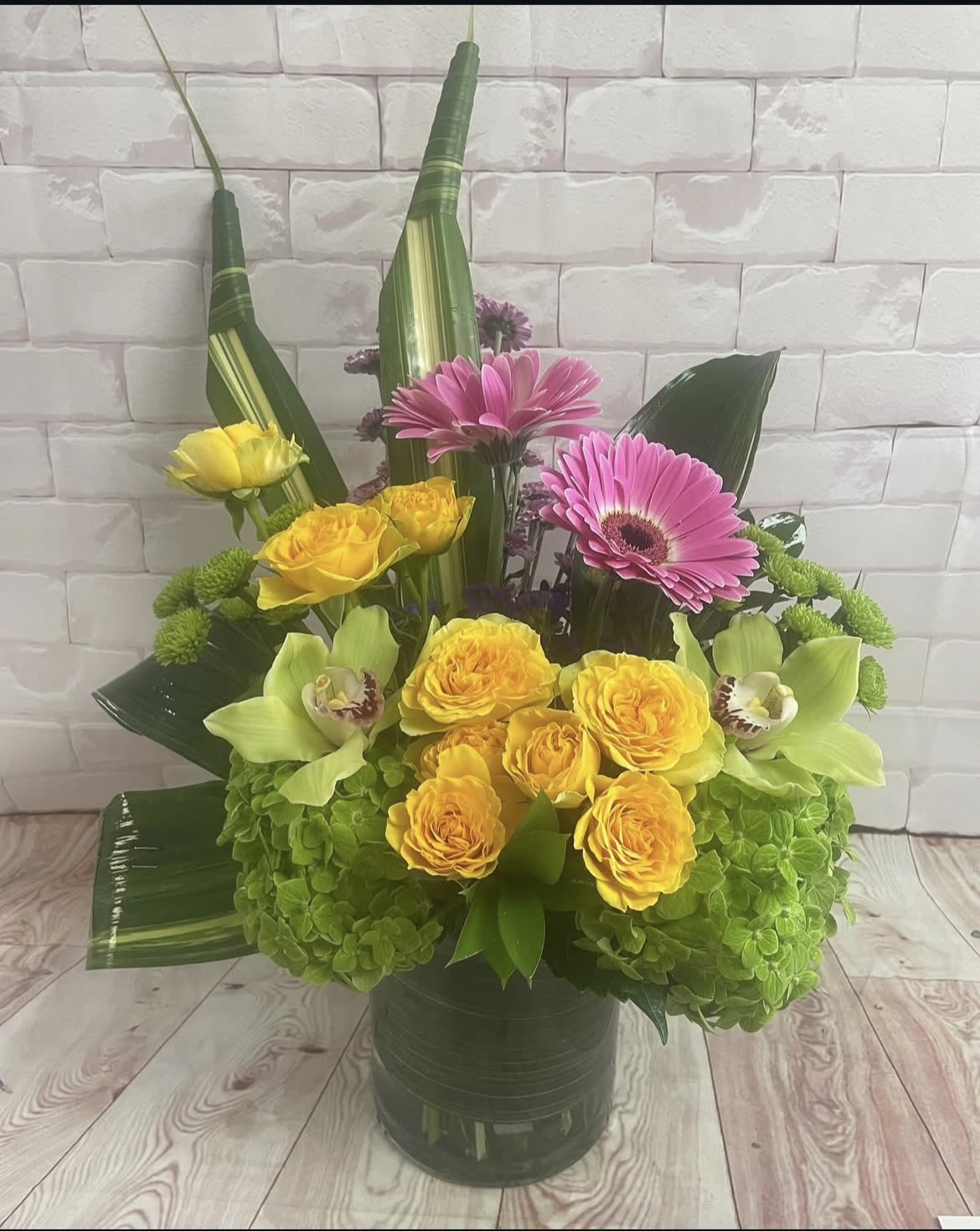 Summer Vibes Summer Vibes - bright , cheerful , gerber daisies , cymbidium orchids , yellow spray roses , green hydrangea , ti leaves and more
