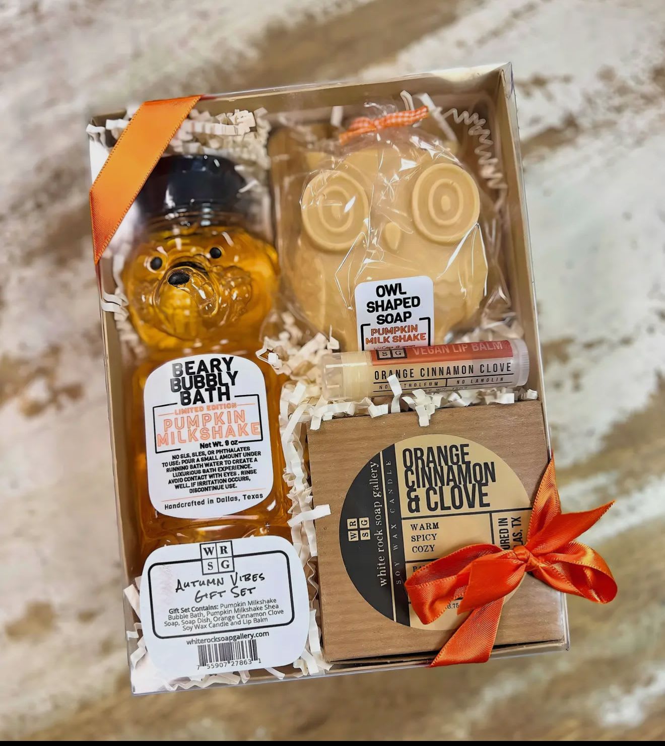 Autumn vibes gift set - Invite cozy fall feels into your home with our Autumn Vibes Gift Set! Perfect for a night of pampering, you'll get a Pumpkin Milkshake Bubble Bath, Pumpkin Milkshake Shea Soap, Soap Dish, Orange Cinnamon Clove Soy Wax Candle, and Lip Balm, all bursting with warm, pumpkin spice scents. Wrapped in a Kraft gift box with fall ribbon. Get ready to indulge yourself in all its autumn glory!