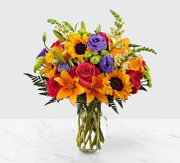 4 summer - Bright summer bouquet with sunflowers lilies roses in a glass vase perfect to brighten someone's day with same day delivery.  #summer  #Getwell  #birthday