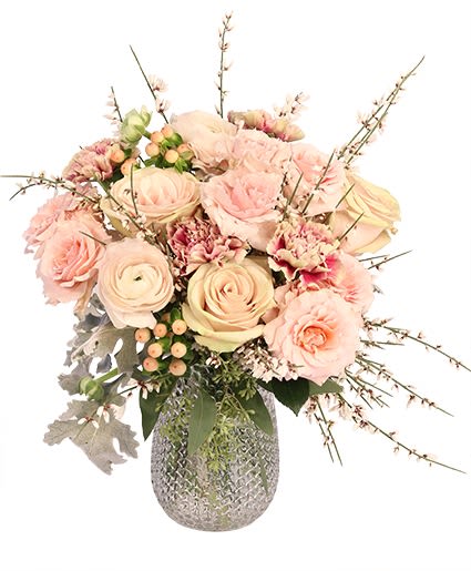 Poetic Pinks Poetic Pinks - **Poetic Pinks Floral Arrangement** Indulge a sense of romantic charm with our Poetic Pinks Floral Arrangement. This enchanting design, presented in a stylish Pebble Stone Vase, with the image shown at $75.00. The arrangement features a delicate base of dusty miller and genestra, creating a soft, textured backdrop. A captivating mix of blooms. The poetic beauty is further enhanced by three stems of classic light pink roses and three stems of charming light pink spray roses, all harmoniously blended to create a truly captivating display. Perfect for expressing heartfelt sentiments or adding a touch of sophisticated grace to any setting.