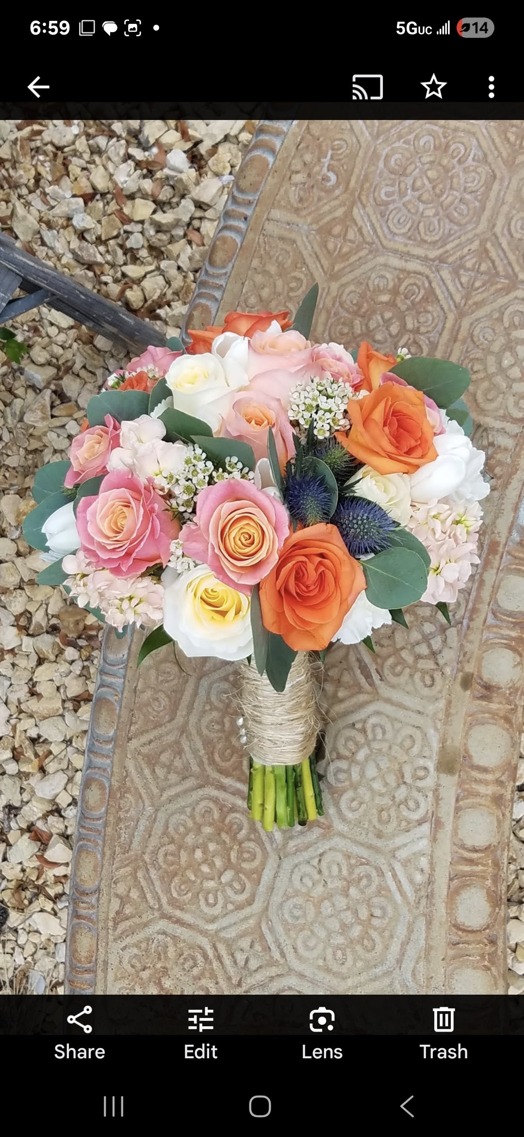 Peaches &amp; cream and a tangerine more. - A floral symphony with a harmony of summery flower notes.  This vibrant bridal bouquet is the perfect choice for celebrating love in any season of the year.  All bridal bouquets include groom's boutinier.