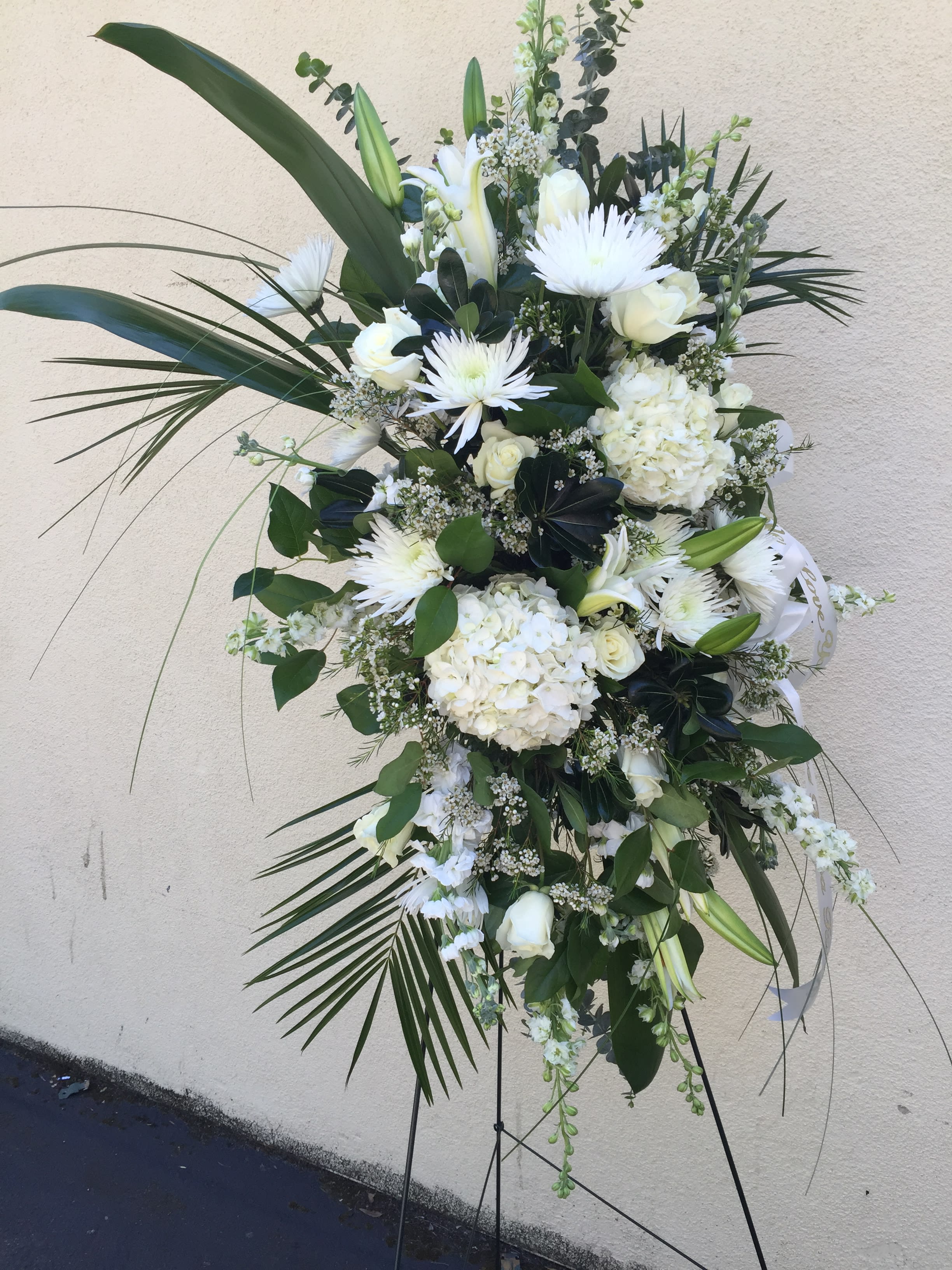 Asymmetrical White Standing Spray - Designer's Choice: A lovely asymmetrical All White Standing Spray of Mixed Flowers 