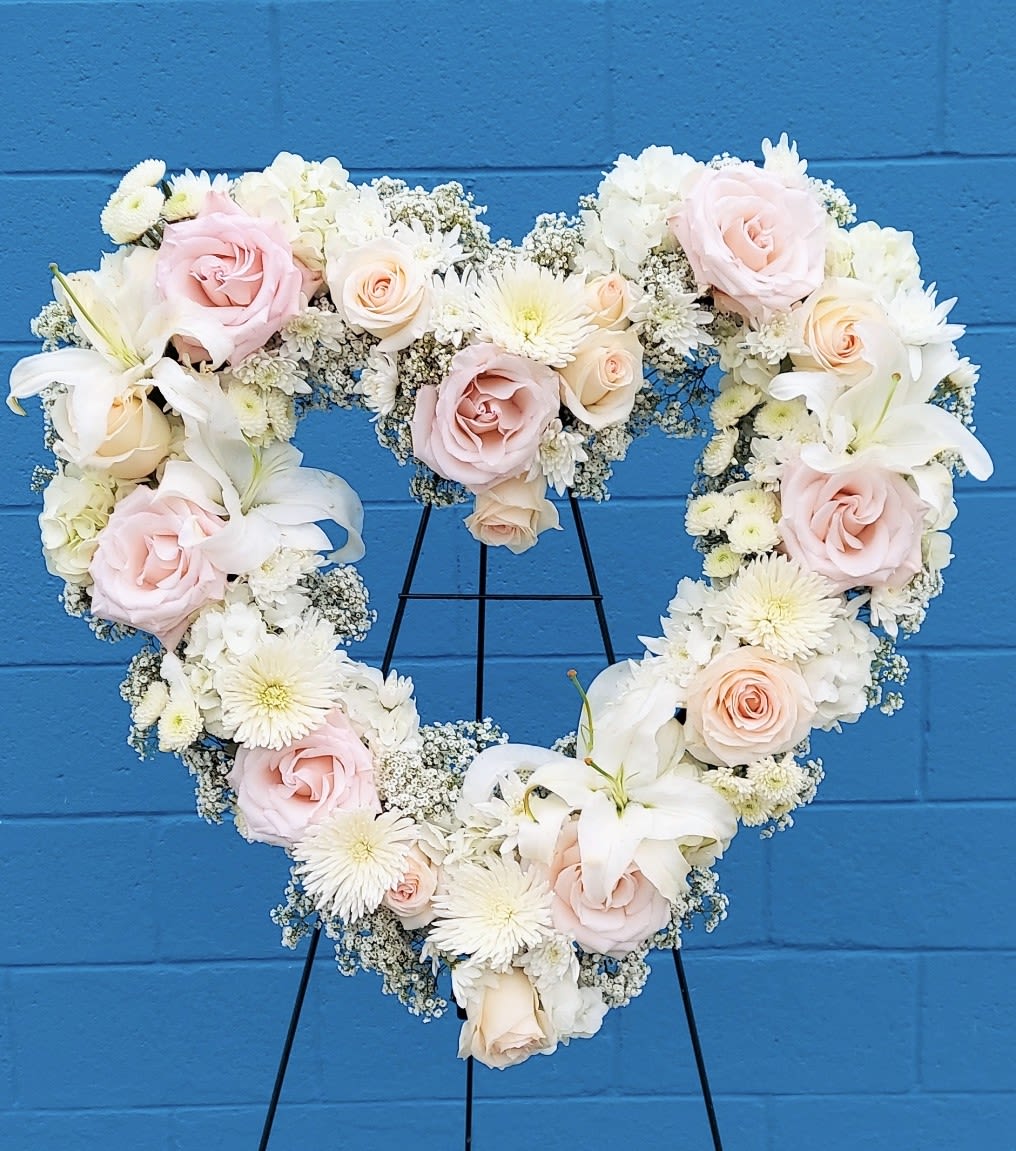 Heart in heaven. - A delicate white heart with a hint of blush, enough to express your heartfelt sentiments.