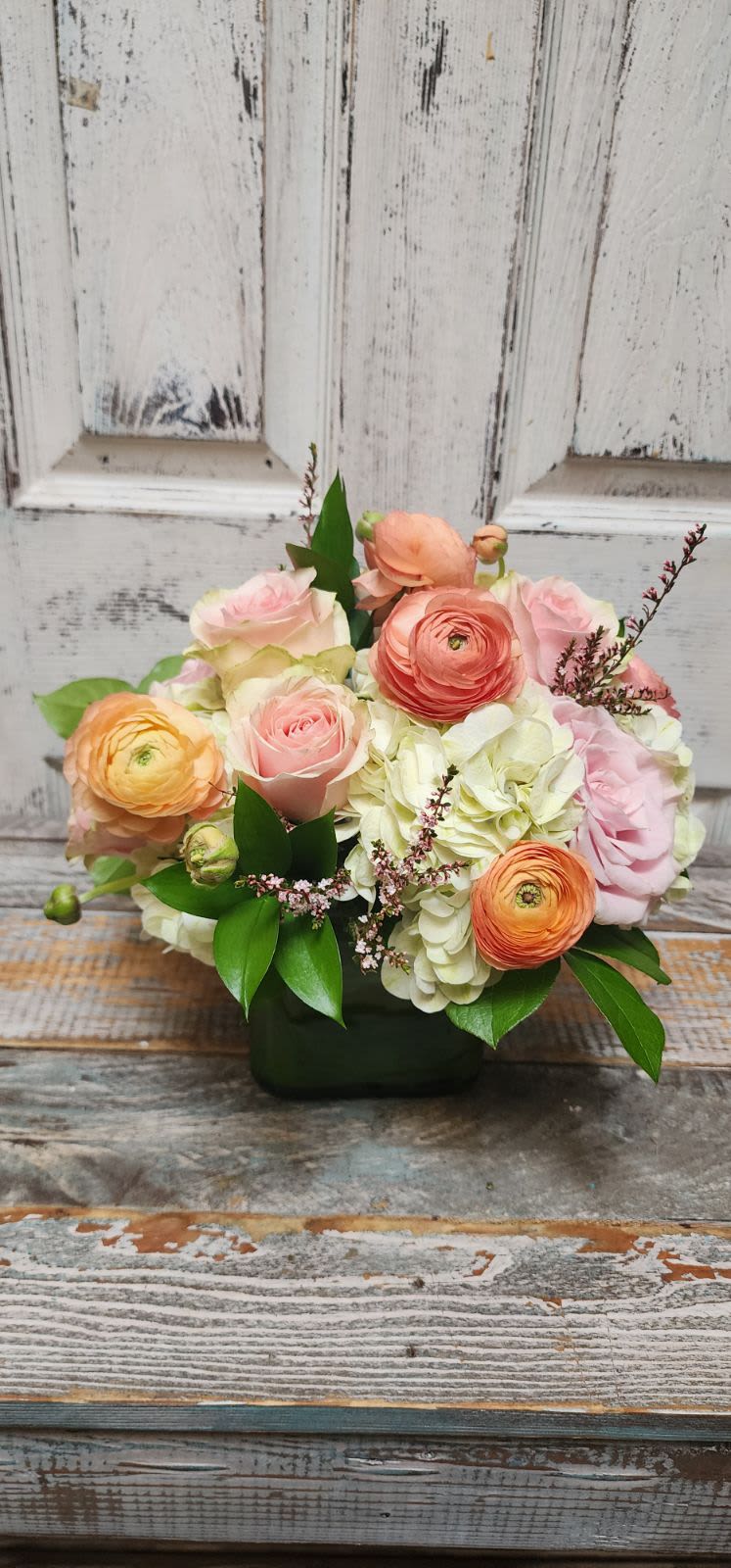 Elegant - This bouquet shows that there is beauty in simplicity. Elegant is the perfect gift for almost any occasion, especially for celebrations and showing gratitude.    Arrangement Details: Includes white roses, blush pink roses, Ranunculus, and white hydrangea.