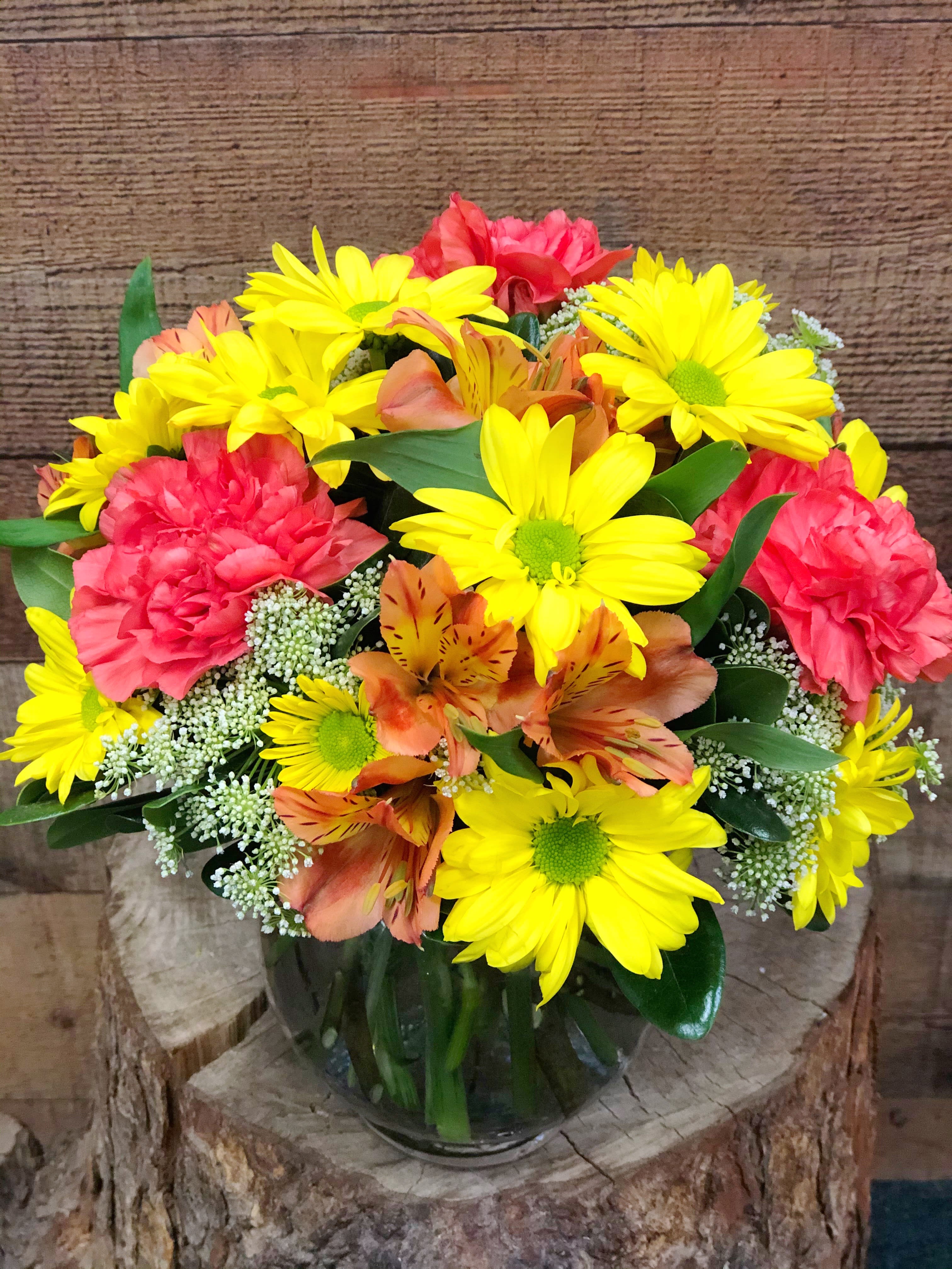 Color Craze Color Craze - This brightly colored assortment of long lasting flowers is sure to bring a smile to anyone's face.