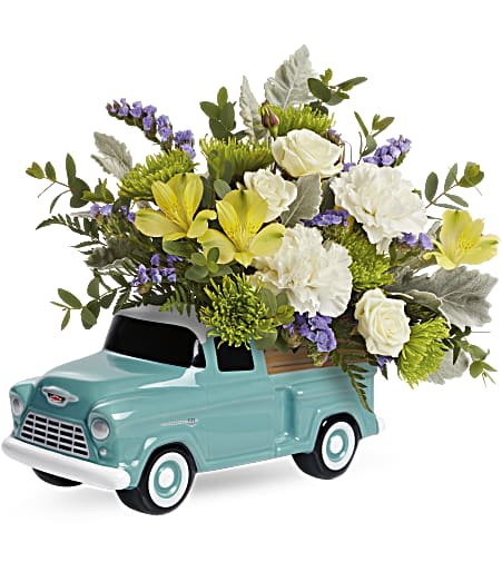 Teleflora's Chevy Trucking Blossoms Bouquet - Talk about a dream machine! Bursting with a fresh rose bouquet, this sweet, hand-glazed ceramic Chevy keepsake is a fun celebration for any occasion.  Delivered in Teleflora's Chevy Pickup Keepsake. Standard size approximately 14 1/2&quot; W x 13 1/4&quot; H