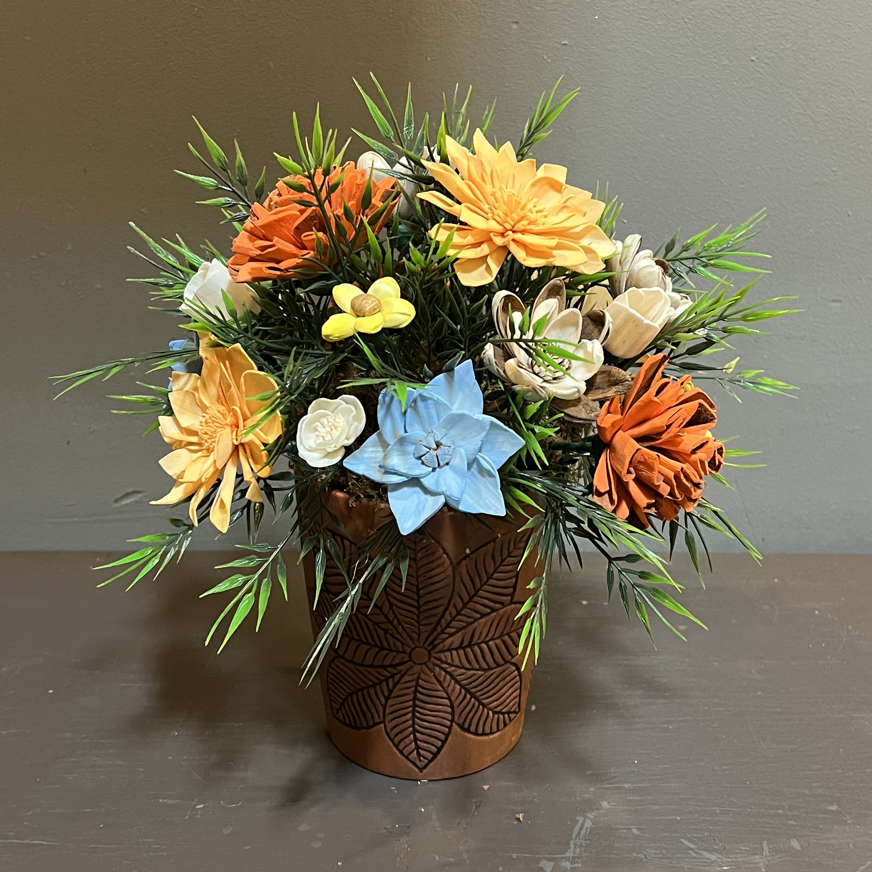 Sola Wooden Flower Centerpiece - Rustic Wildflowers Sola Wooden Flower Centerpiece - Rustic Wildflowers - Hand-dyed and hand-crafted in Minneapolis, these flowers made of balsa wood are a wonderful everlasting floral arrangement - great for those with allergies! Can be used as a natural essential oil diffuser too! Arrives in a keepsake vase. Approx. Dimensions: 13"Tx11"W