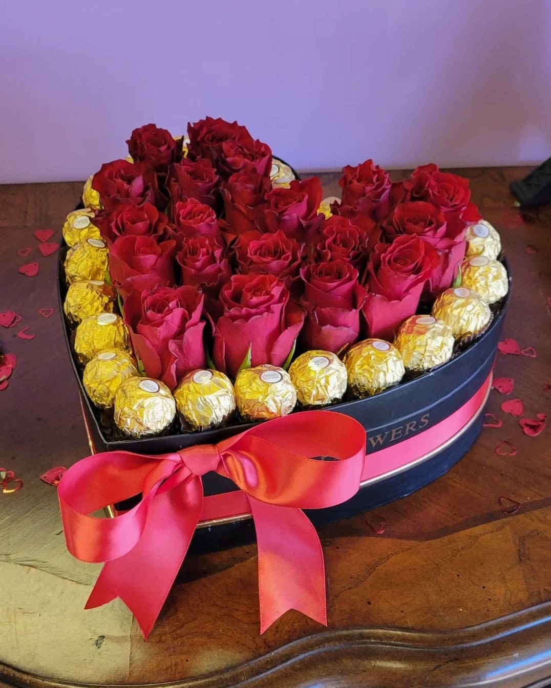 Heart Seduction  - Seduce your chocolate lover with this beautiful heart arrangement. Featuring red roses and ferrero rocher chocolates. 