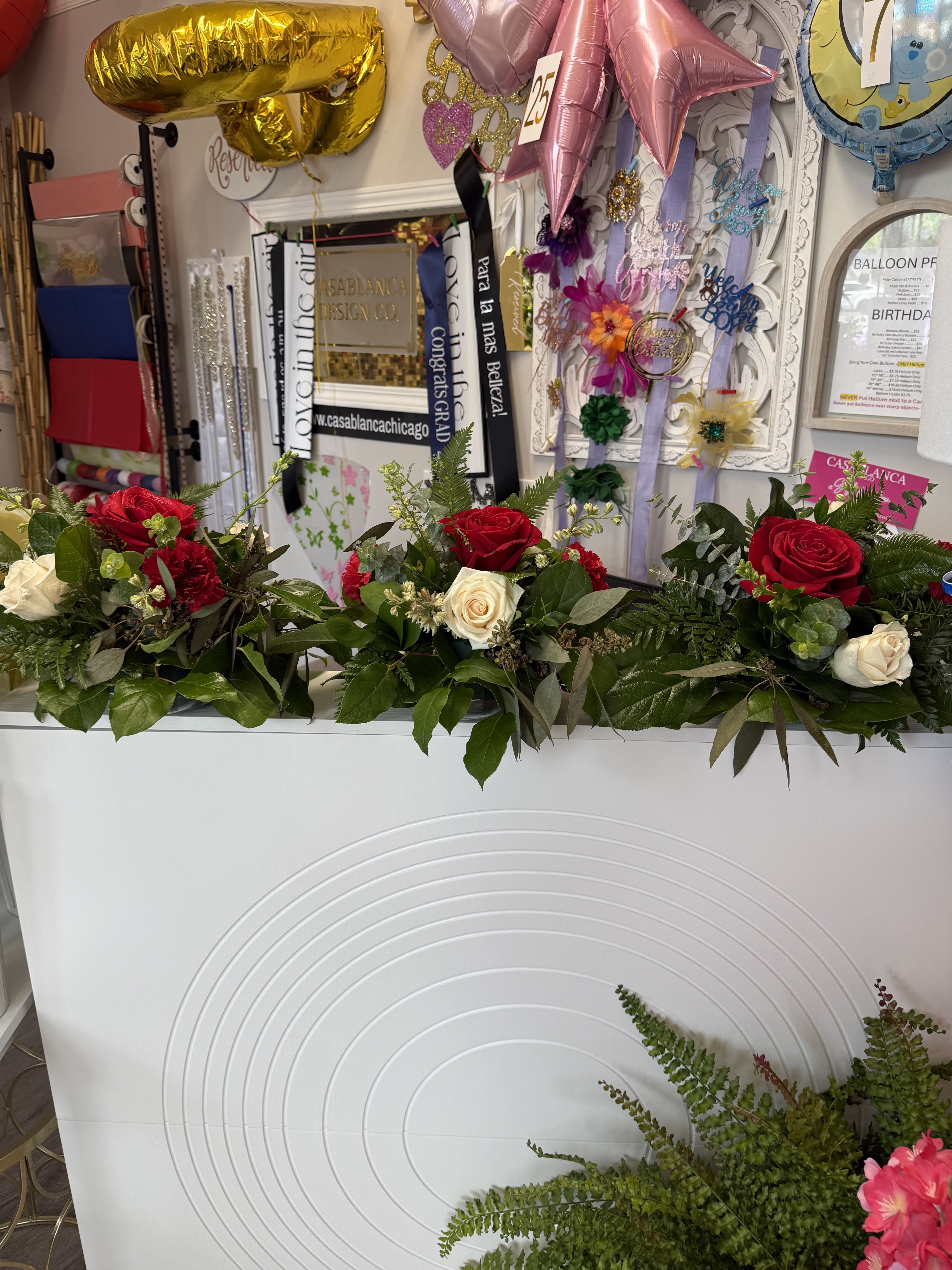 Casablanca MINIS  - Perfect for dinner parties where you want to elevate your space. Several green textures and your choice of focal flowers. 