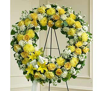 Serene Blessings Standing Wreath Serene Blessings Standing Wreath - Yellow and white flowers such as roses, Asiatic lilies, carnations, mums and more. This standing wreath is symbolic of the love and respect you have for a life joyously lived. As Shown : HUD-91303