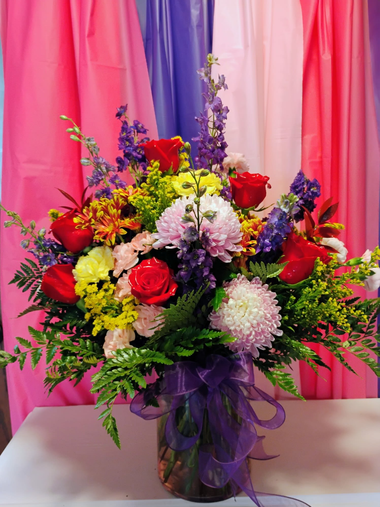 Surprise! - This beautiful arrangement has roses, carnations, mums, solidago, and stock. Perfect for any occasion! 