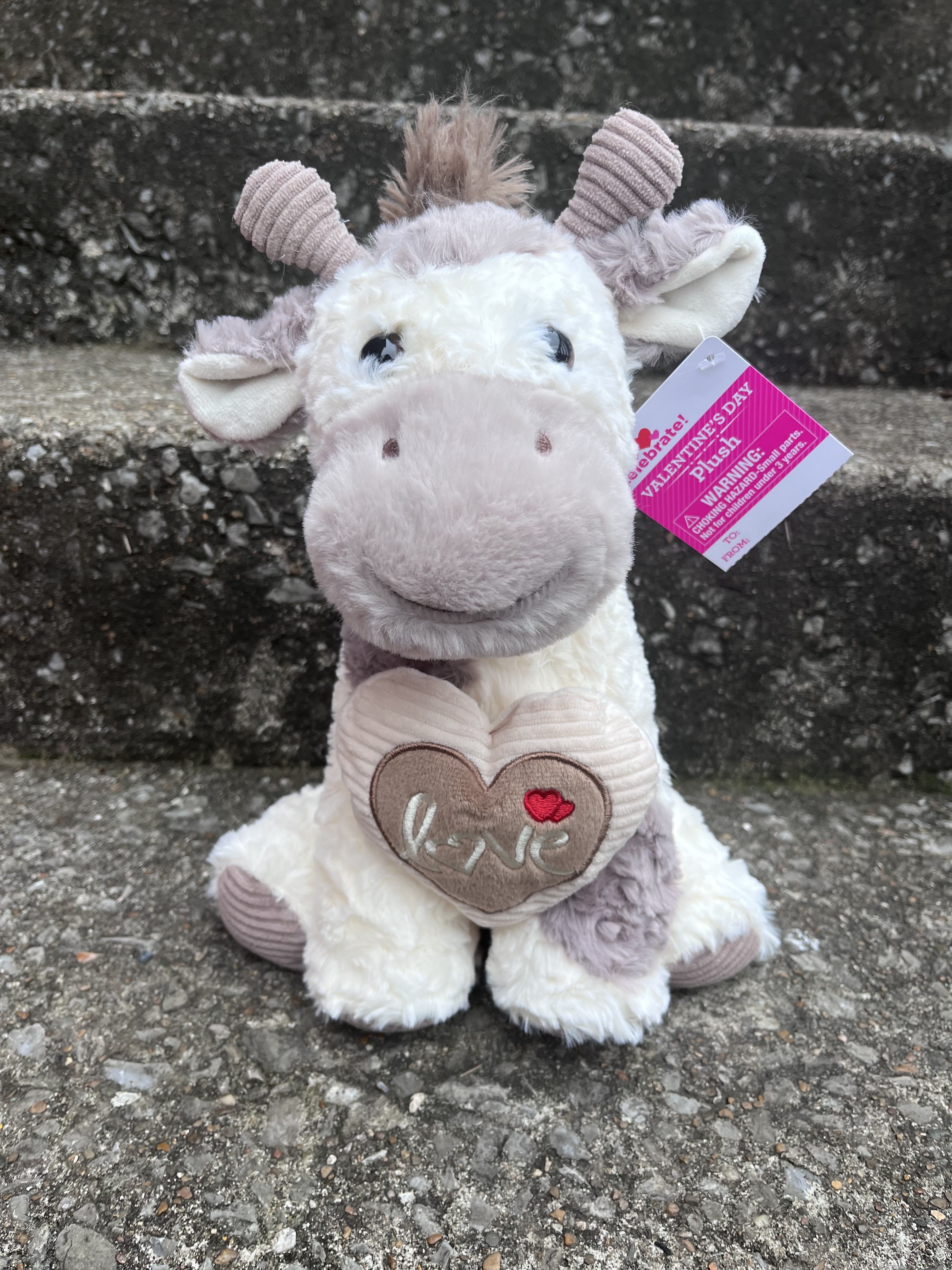 Plush Giraffe Plush Giraffe - Very soft and very cute!!! Makes an adorable gift!
