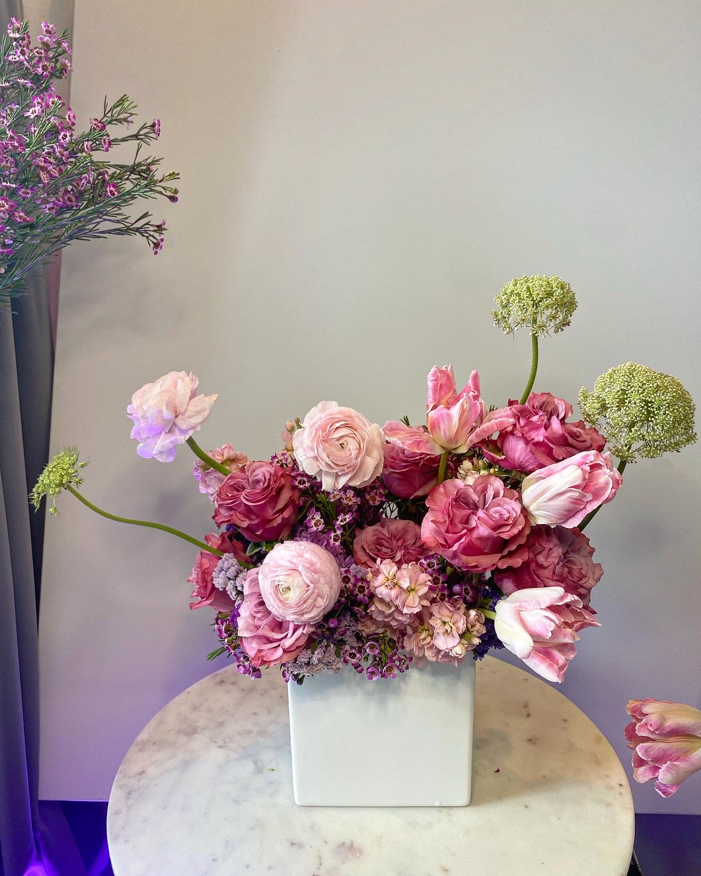 Golden Hour Bloom - Inspired by the warm glow of late afternoon sun, Golden Hour Bloom pairs rich amber roses, golden yarrow, and creamy dahlias with dried accents for a radiant, earthy arrangement. Ideal for autumn events or adding a cozy-luxe feel to your space.  