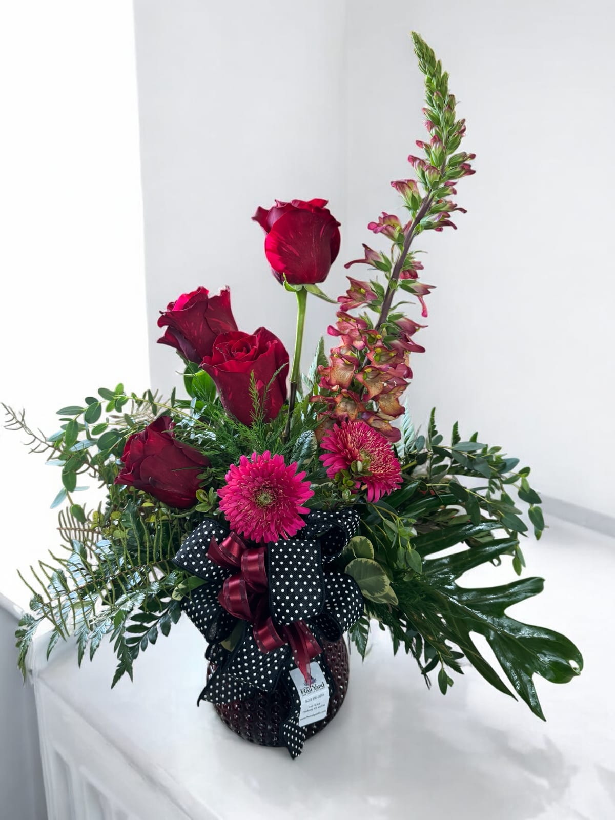 Radiant in Red - A mixture of deep and rich tones in dark red and pink - an elegant choice for your loved one!