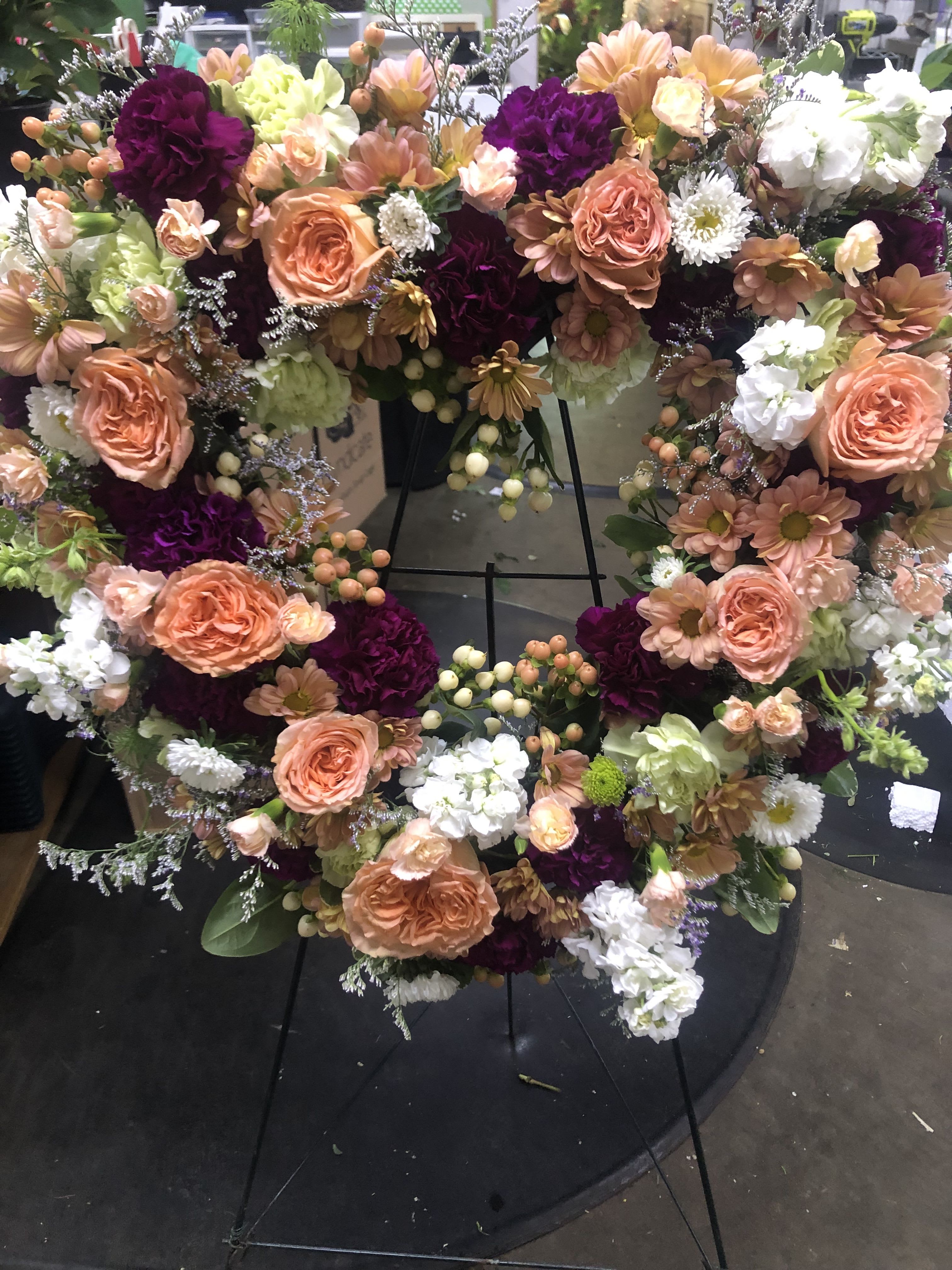 Peachy Heart - Peach roses and white stock in heart shape for standing spray