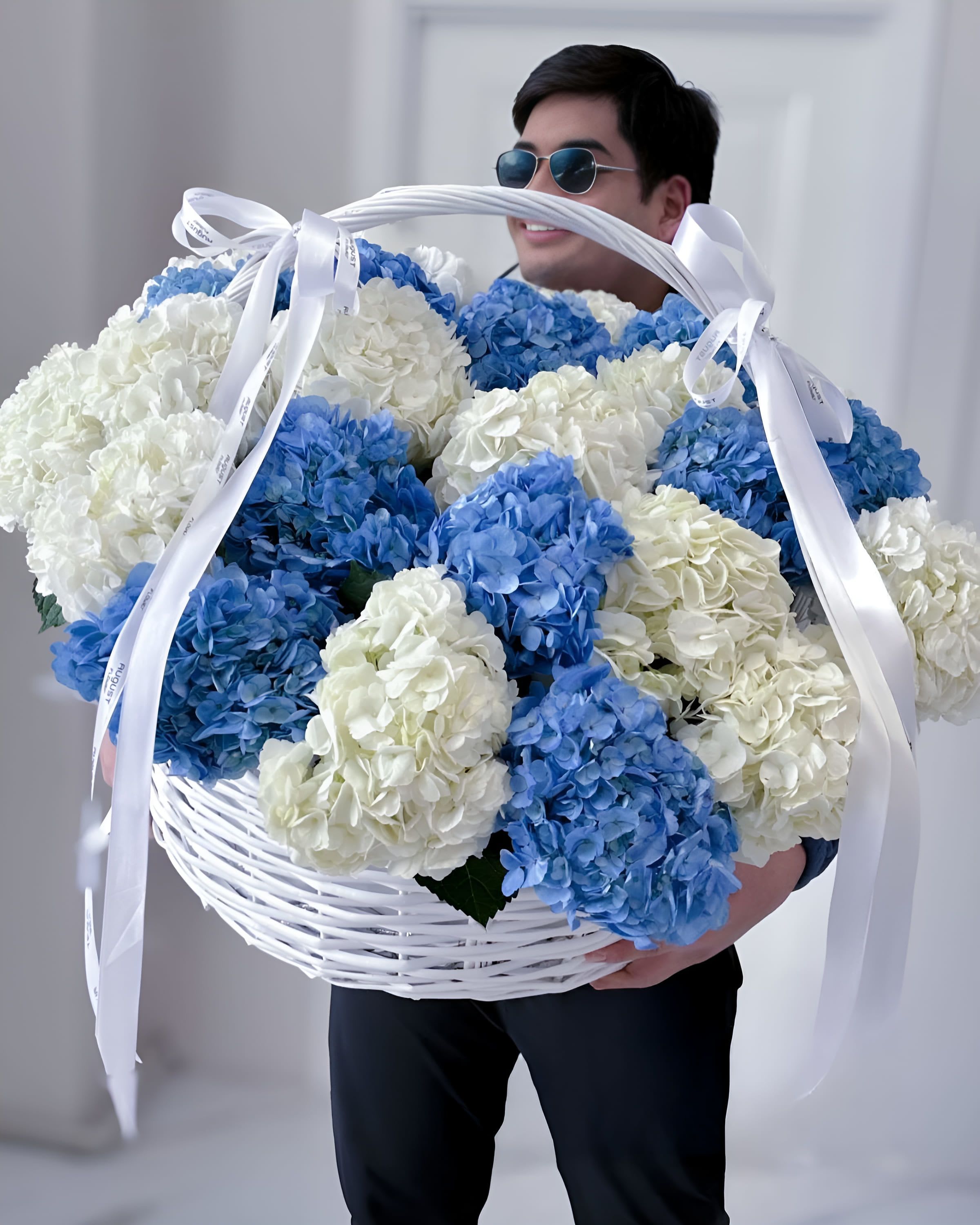 It’s a Boy! - Celebrate the arrival of a little prince with this stunning oversized basket of sky-blue and ivory hydrangeas. It’s a Boy! is a joyful floral statement, perfect for baby showers, welcome-home gifts, or hospital deliveries. Overflowing with softness and charm, it’s a heartfelt way to share the happiness of new beginnings.