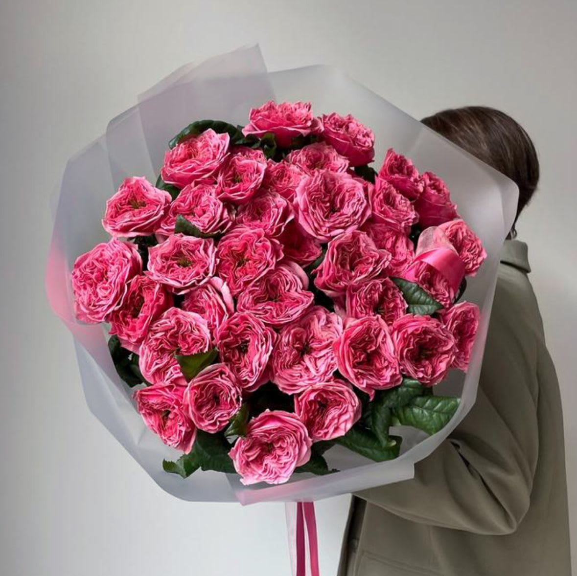 Pink Expression roses - This bouquet of fresh garden roses, elegantly wrapped in matte film and tied with a ribbon, is perfect for adding a touch of romance or showing appreciation. With a soft pink hue, these roses bring a sense of grace to any occasion, making it an ideal choice for heartfelt gestures and expressions of love.