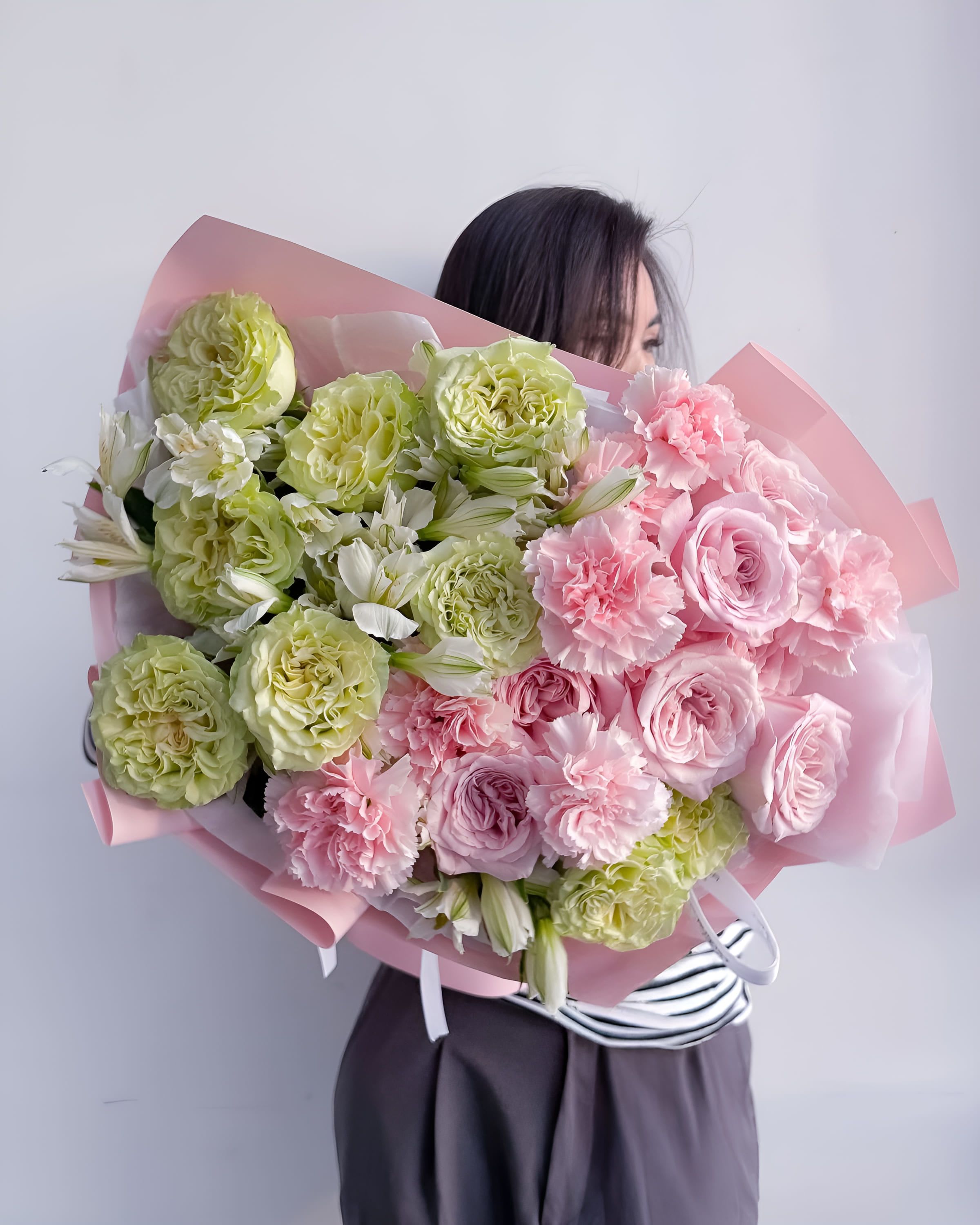 Spring Lush - A refreshing and elegant bouquet of soft pink and green garden roses, delicate pink carnations, and creamy alstroemerias. Spring Lush captures the essence of a blooming garden after rain — fresh, tender, and full of life. A perfect choice for spring celebrations, housewarmings, or to brighten someone’s heart with natural beauty.