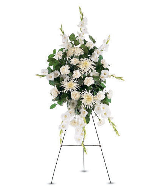 Standing White Promises Spray - This traditional spray, filled with white carnations, chrysanthemums and gladoli, makes the promise that love is eternal.