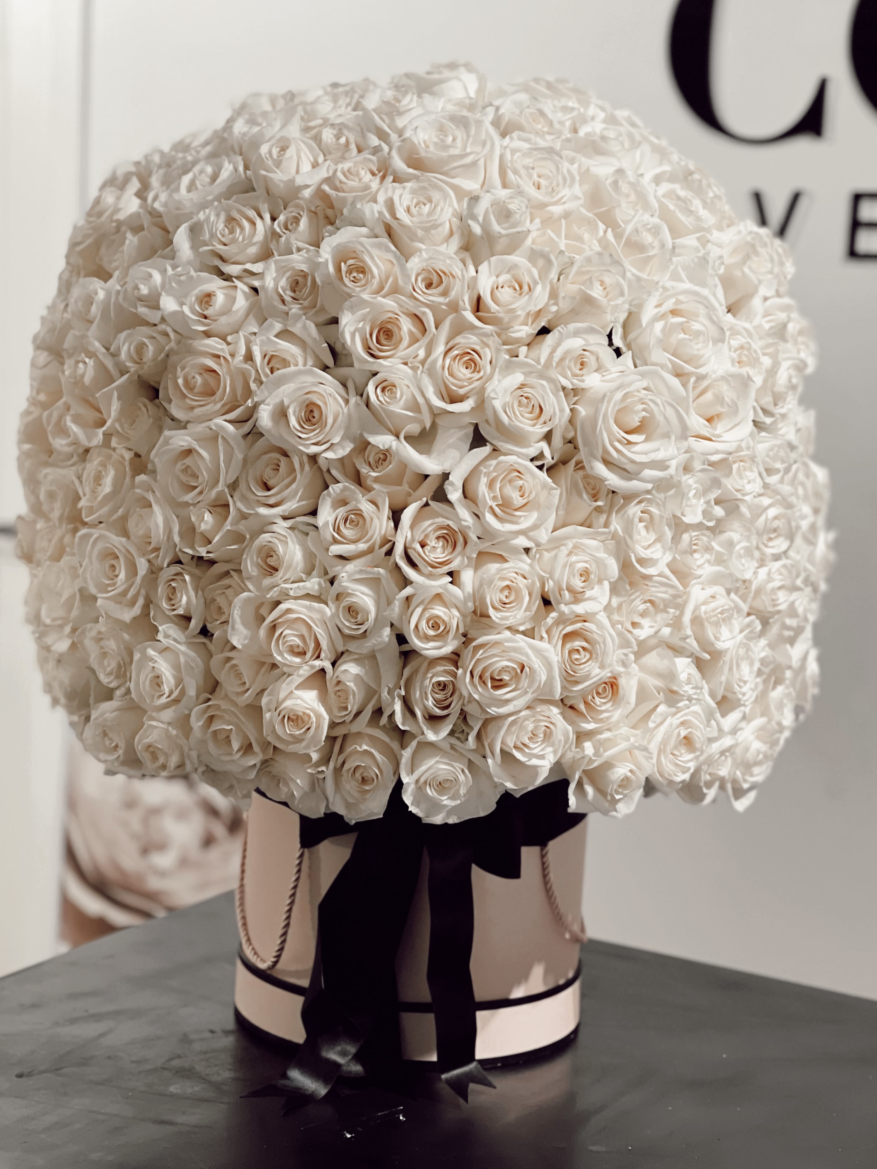 Luxury Rose Arrangement  - Indulge in the elegance of a luxury rose arrangement, expertly designed to make any occasion unforgettable. Featuring premium roses, this exquisite bouquet can be customized with your choice of colors to suit your style. Perfect for weddings, anniversaries, or as a lavish gift, it's a timeless symbol of beauty and sophistication.