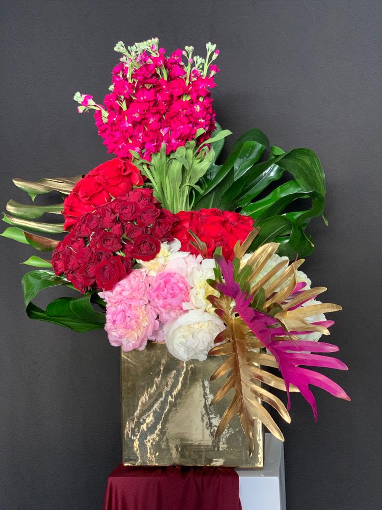 Mixed Red roses, Hydrangeas, &amp; Peonies Floral Arrangement - Discover the beauty of our Mixed Red Roses, Hydrangeas, and Peonies Flower Arrangement. This stunning bouquet combines the timeless elegance of red roses with the soft charm of hydrangeas and peonies, creating a perfect gift for any occasion. Whether it's a celebration, anniversary, or just because, this exquisite floral arrangement brings luxury and romance to any space. Order today for a fresh, vibrant touch of nature