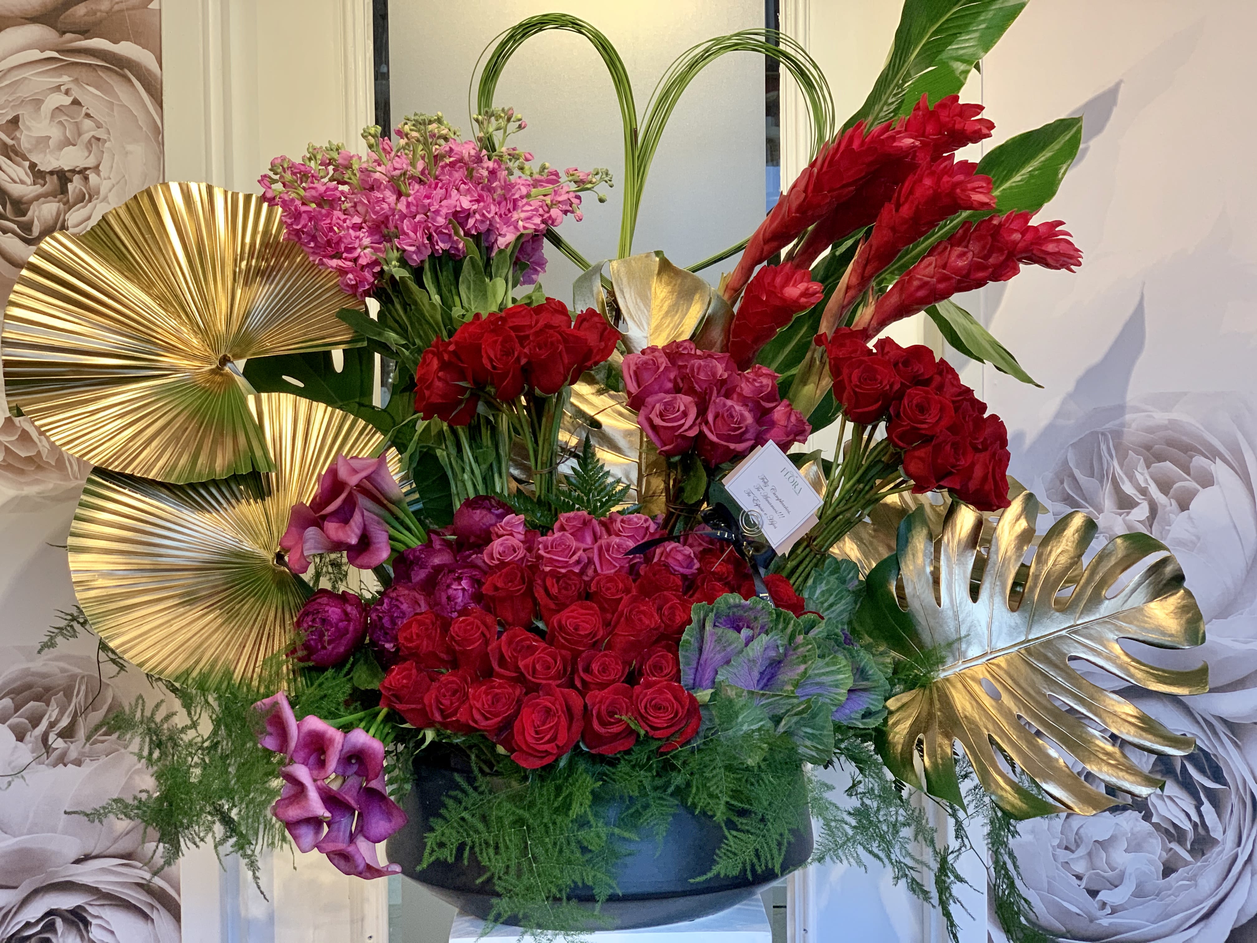 Elegant 300-Rose Floral Arrangement with Gold &amp; Greenery - Beautiful floral arrangement featuring Red Ginger, Stock, Sweet Pea, and Roses. Please note, flower varieties may vary based on availability, but the quality and elegance of your bouquet will always be guaranteed. Order now for a stunning gift or special occasion!