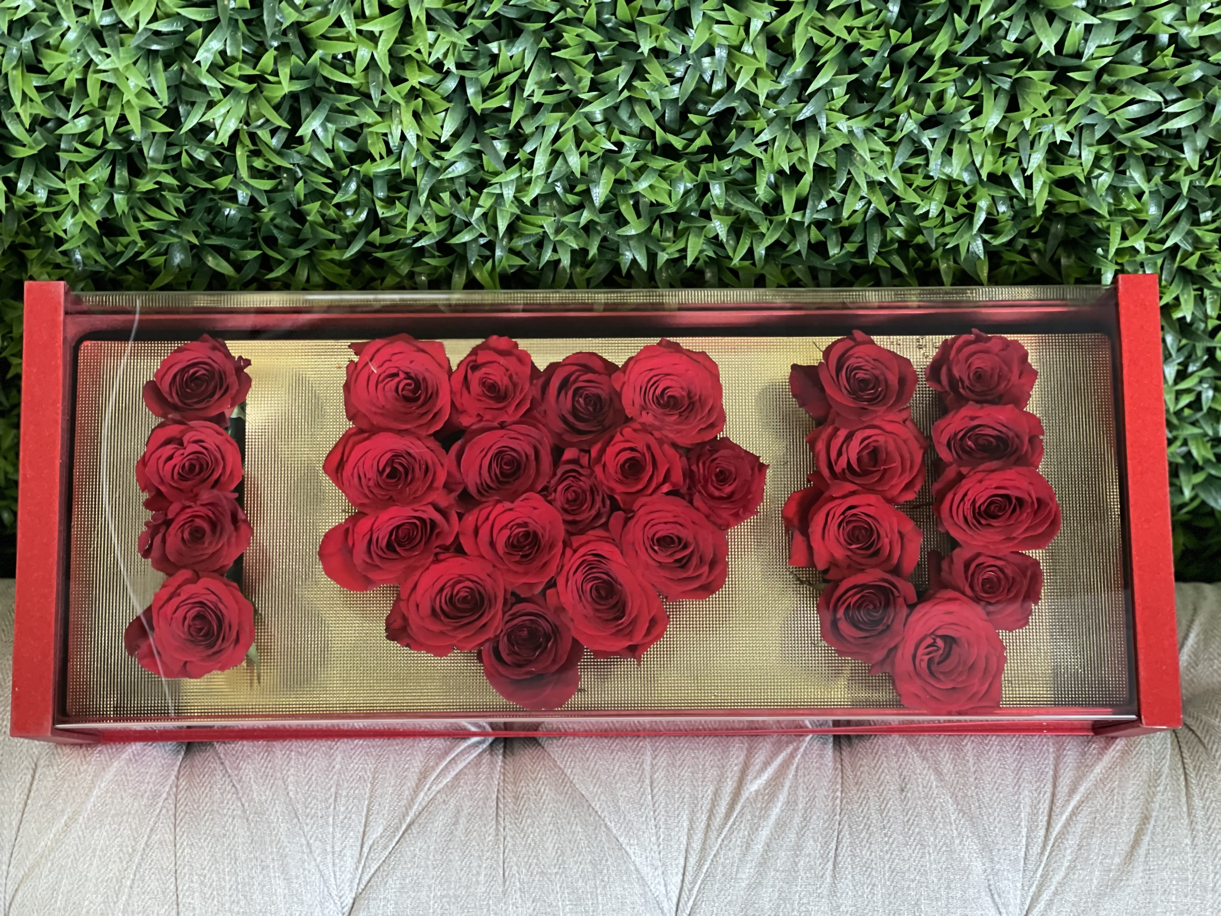 I Love U Rose Box - Unique and heartfelt arrangement of roses spelling 'I LOVE U' in a beautiful box. The perfect romantic gift for expressing your love on any special occasion. Order this thoughtful and unforgettable arrangement today!