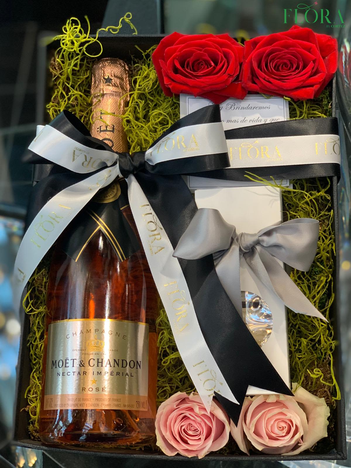 Moët &amp; Macarons Flower Box – Luxury Gift Set - Indulge in the luxury of a Moët &amp; Macarons Flower Box, featuring a stunning floral arrangement paired with exquisite Moët Champagne and delicious macarons. The perfect gift set for celebrations, anniversaries, or special occasions. Order this elegant treat today!