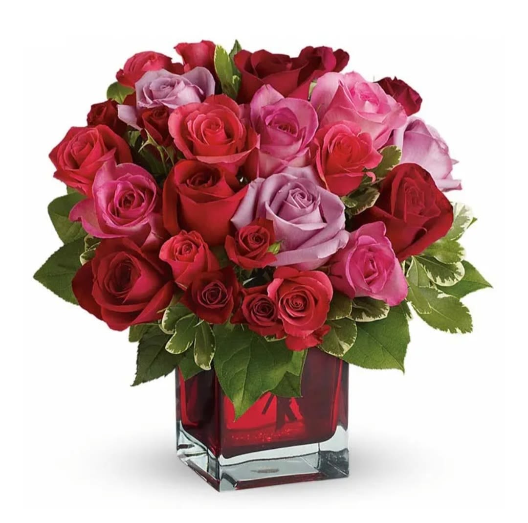 Raspberry Beret by Pretty in Petals Flower Shop  - The Raspberry Beret flower arrangement features a lovely assortment of pink and raspberry-colored flowers, including a beautiful spray roses and garden roses, all elegantly wrapped in your choice of a standard or deluxe vase.