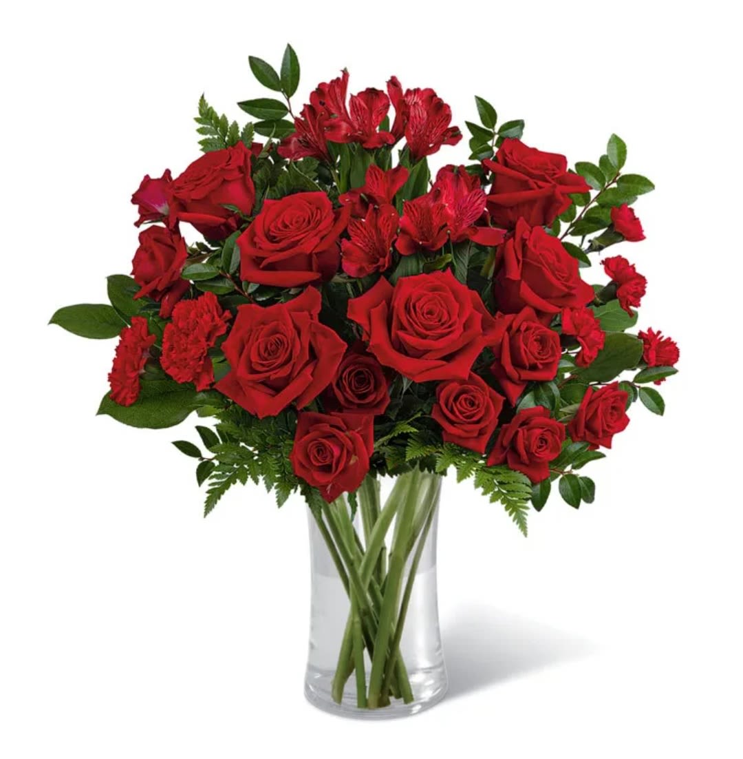 Red Romance by Pretty in Petals Flower Shop  - Looking for a romantic gift for your beloved? Look no further than Red Rose Romance, a luxurious arrangement of bright red roses. The perfect gift to celebrate your love, this arrangement of roses is the ultimate expression of romantic passion.