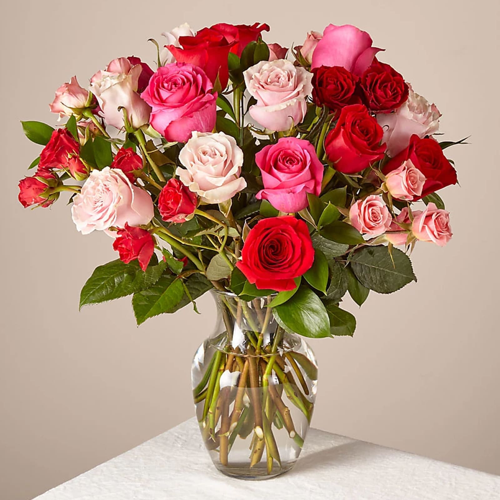 Meant to Be Bouquet Meant to Be Bouquet - Meant to Be Bouquet is a charming arrangement that brings a touch of romance and elegance to any space. Featuring classic roses and delicate spray roses in blended shades, accented with lush mixed greenery, all beautifully arranged in a clear glass vase. Perfect for birthdays, anniversaries, thank-you gifts, or simply to show someone they’re on your mind. Approximate Size: 16” H x 14" W. A lovely way to share your heart.
